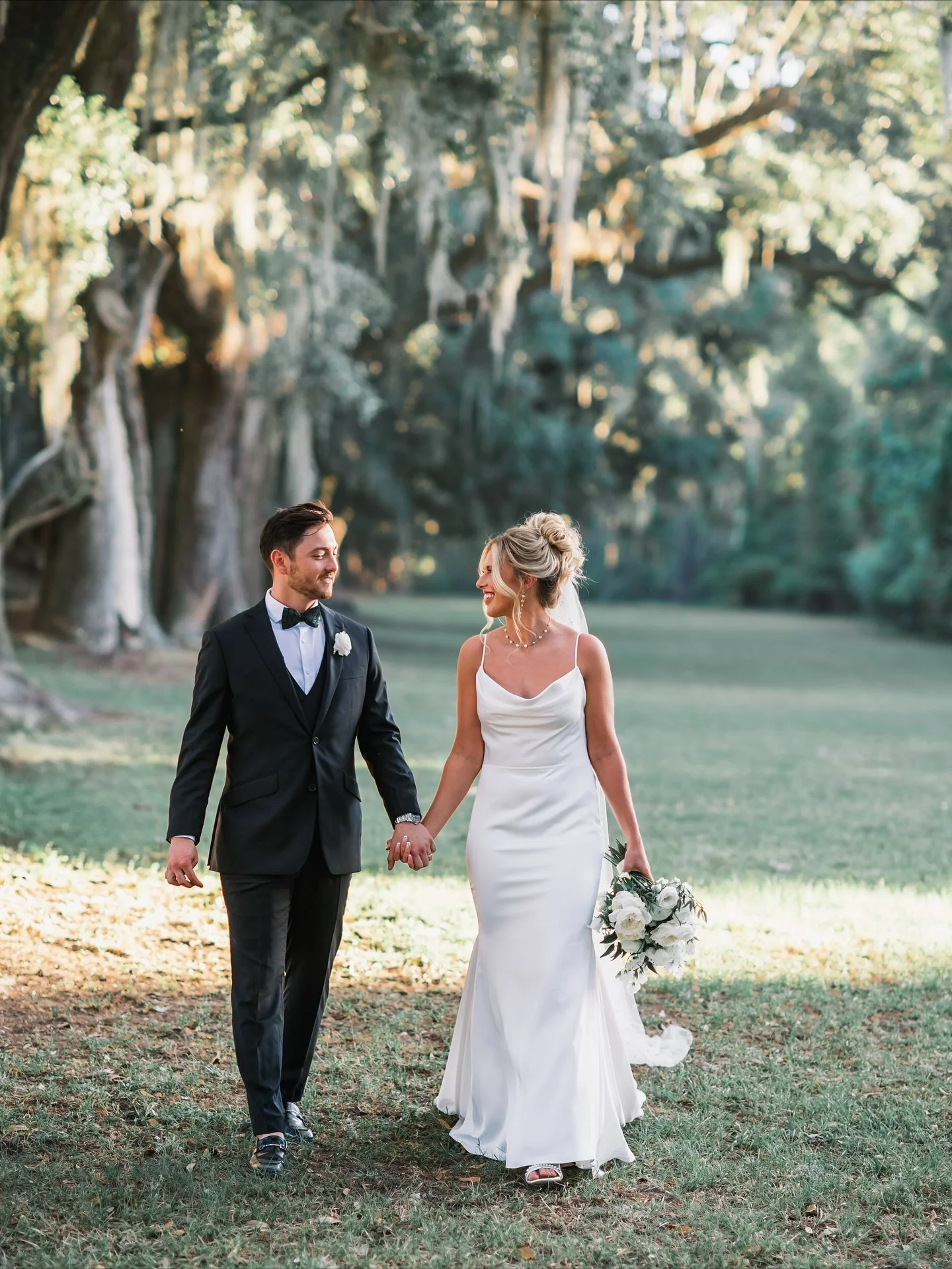 Happy first anniversary, Avery and Brandon! From shades of green to champagne towers, a day we’ll never forget. 🤍🥂
.
.
Planning & Design: @grove.designs.co 
Photographer: @brandonlataphoto 
Venue: @boonehallweddings 
Hair and Makeup: @pap