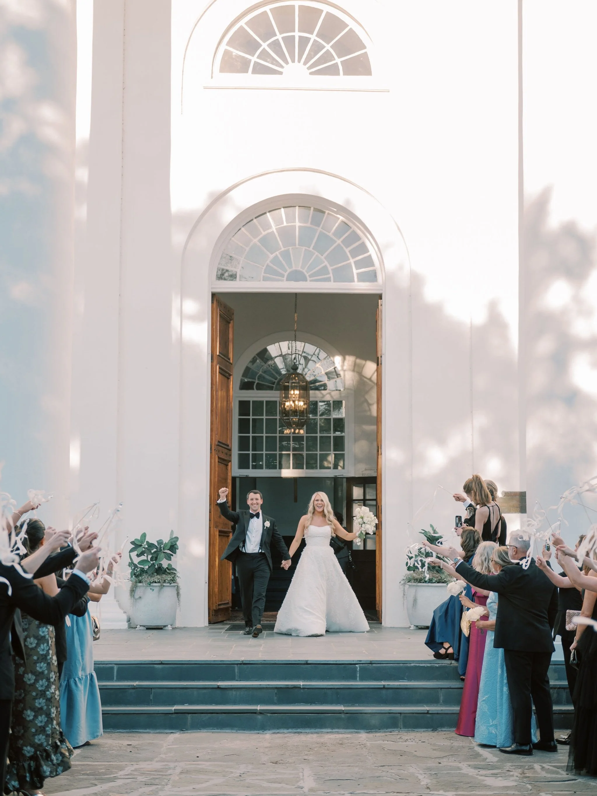A church exit will never go out of style. 🤍
.
.
.
Planning &amp; Design:&nbsp;@grove.designs.co
Photographer:&nbsp;@haleyfosterphoto 
Church: @2ndpc 
Hair &amp; Makeup: @lashesandlacechs 
Floral:&nbsp;@freshweddings_chs