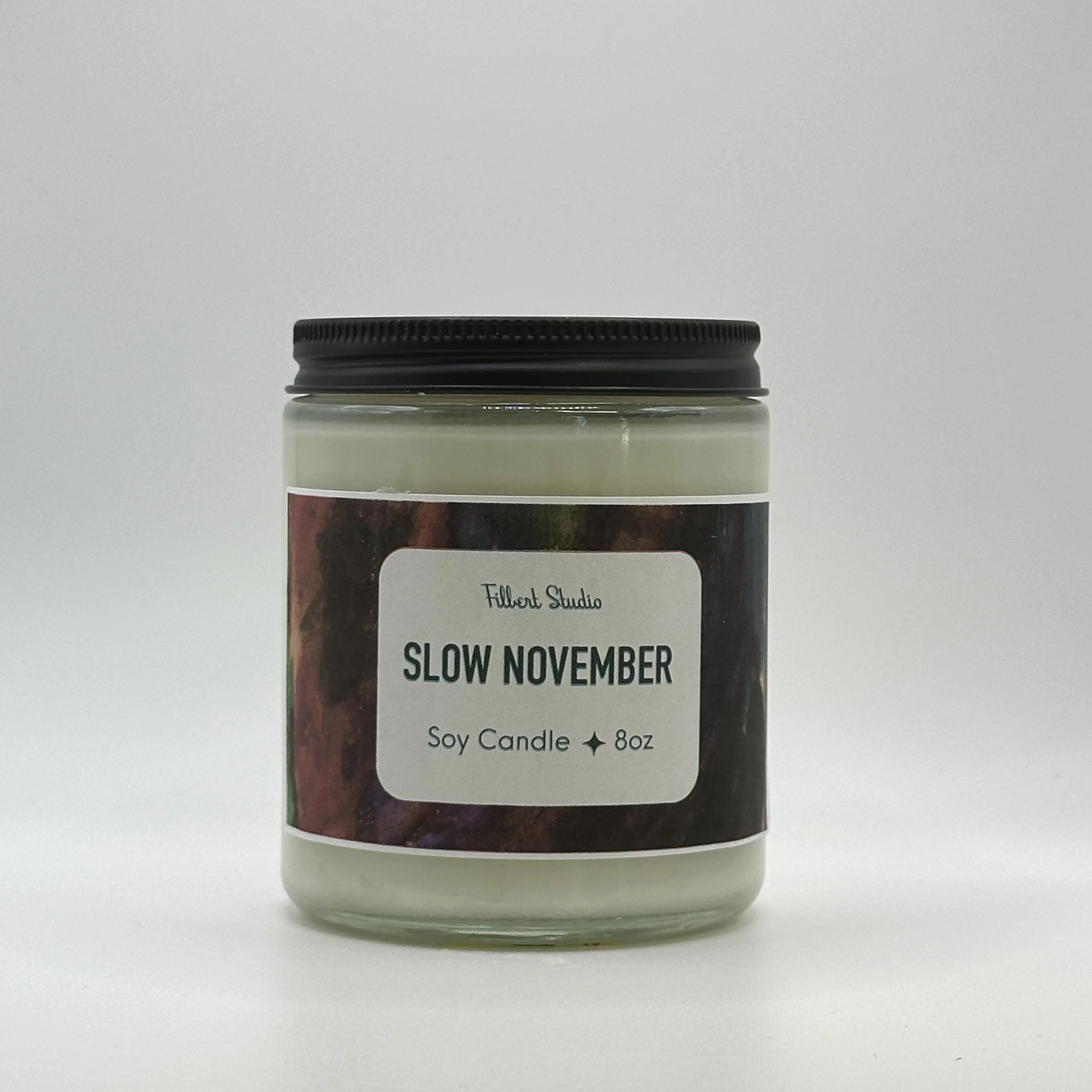 8 oz candle with watercolour label jar with black metal lid