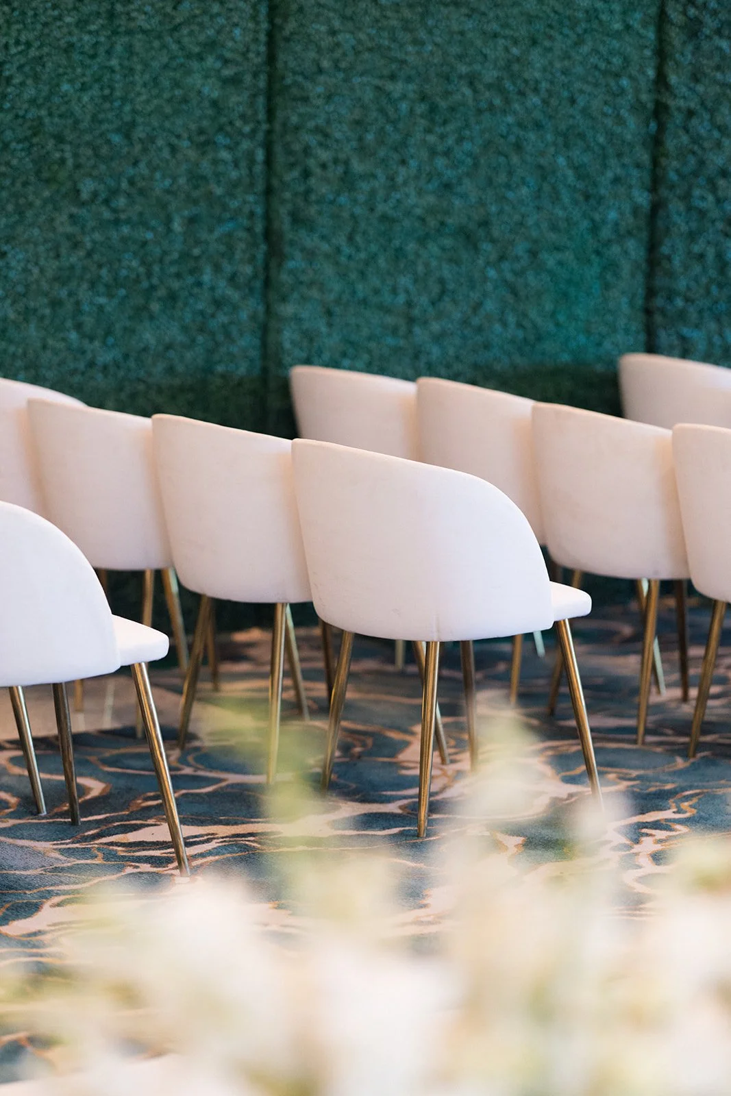 White Velvet Chairs at Wedding Ceremony