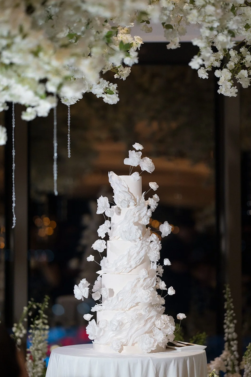 White wedding cake with flowers