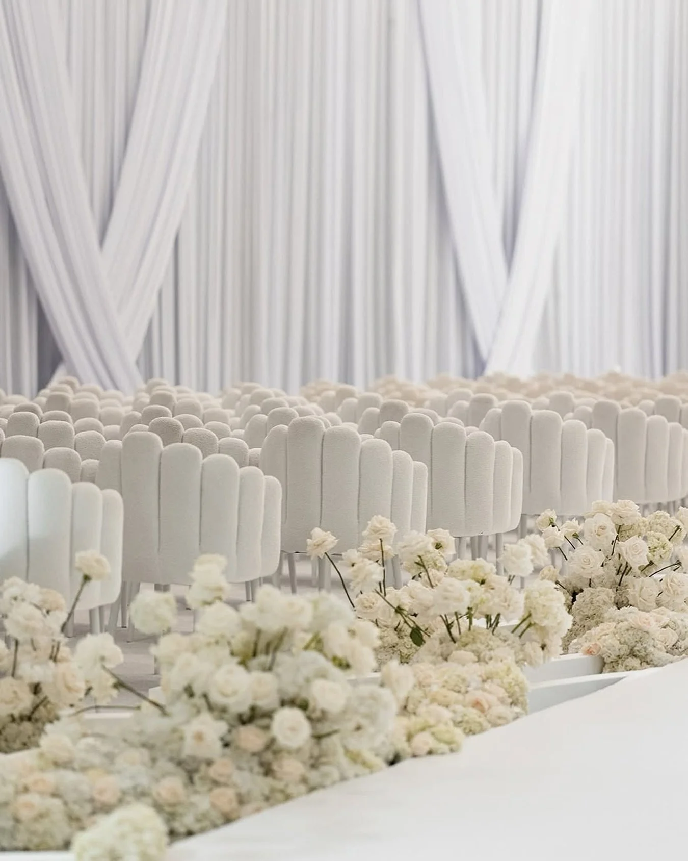 If a ceremony isn&rsquo;t interesting through color, it has to be interesting through shape. If it isn&rsquo;t interesting through shape, it has to be interesting through texture. 

This stunning white on white ceremony was interesting all the way ar