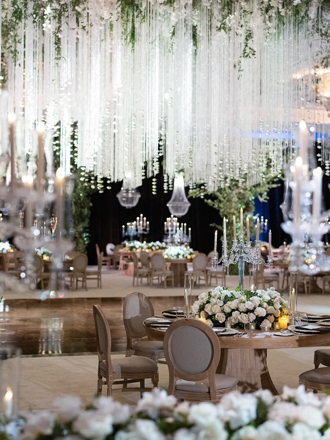 Bringing the outside in, with dazzling crystal accents falling from the sky. 

We love the look of an &ldquo;outside&rdquo; wedding when it&rsquo;s paired with the elegance and opulence of a ballroom installation. 

For many couples, going for glam m