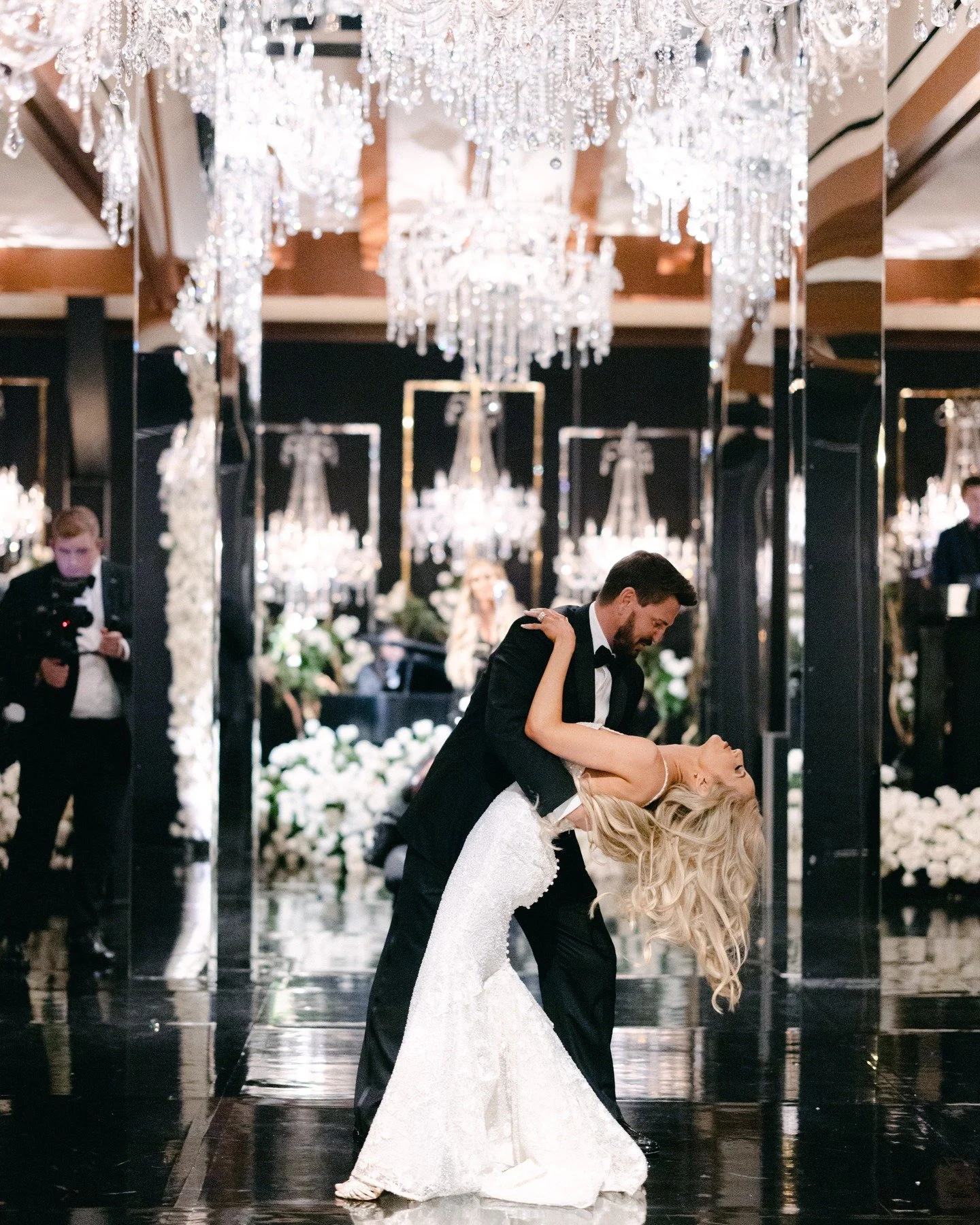 It&rsquo;s easy to look at a room like this and think THIS is what luxury is.

The high-gloss black dance floor. The luxe white velvet furnishings trimmed in gold. Crystal candelabras glowing like a diamonds suspended in the darkness.

It is breathta