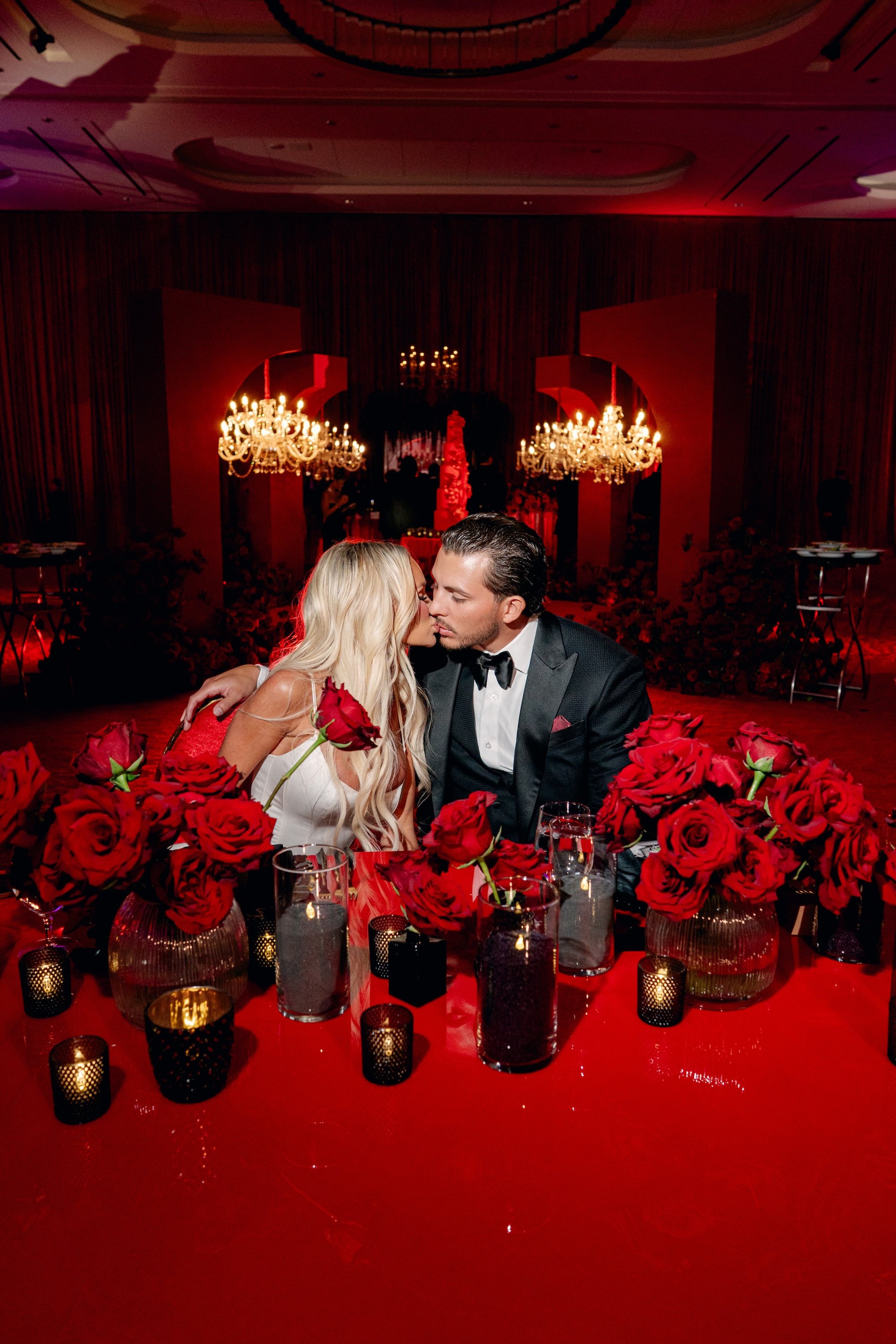 Red and black modern wedding reception at Fontainebleau Las Vegas.  Luxury Las Vegas Wedding Planner Andrea Eppolito.