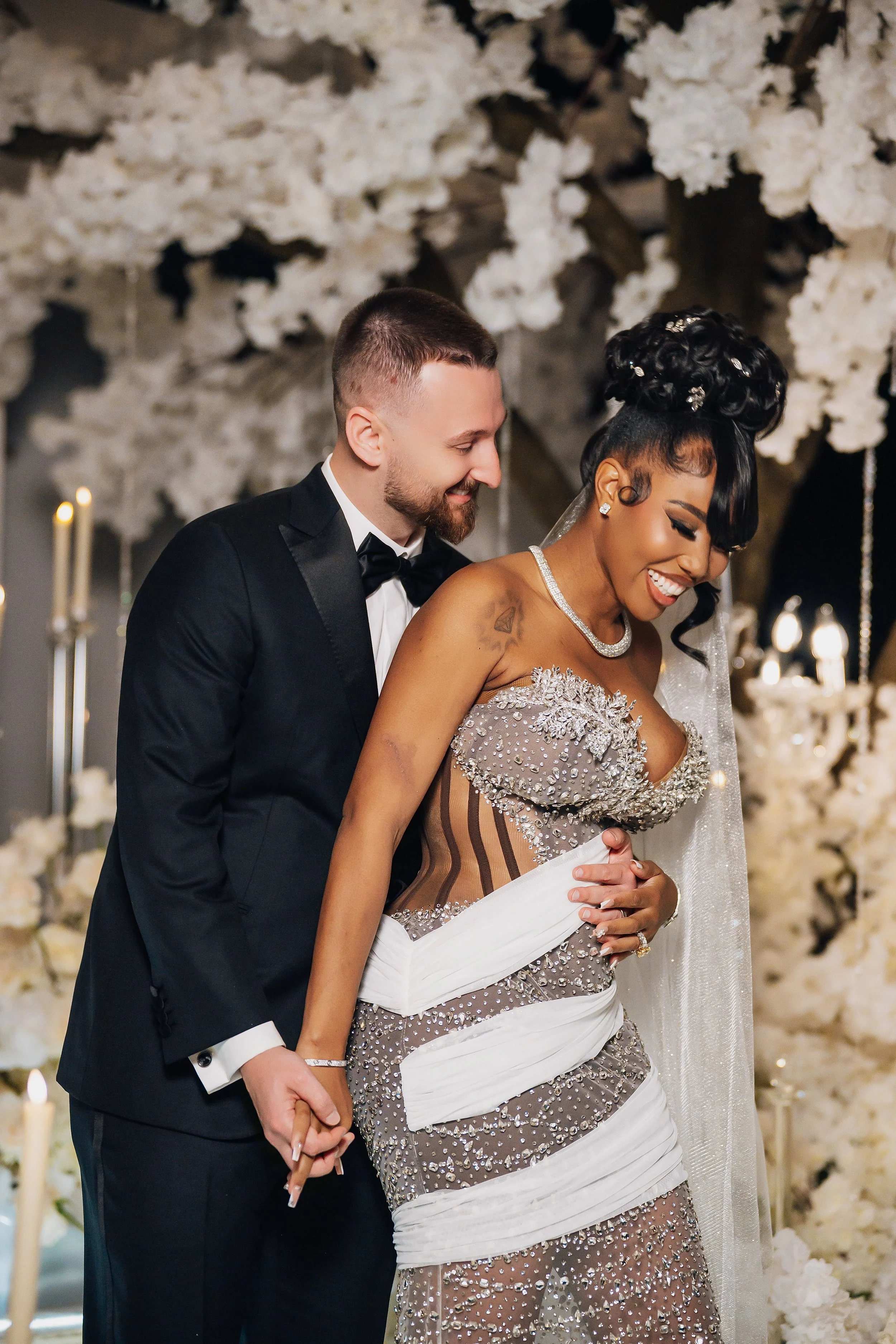 Bride and Groom Share A Moment of Laughter