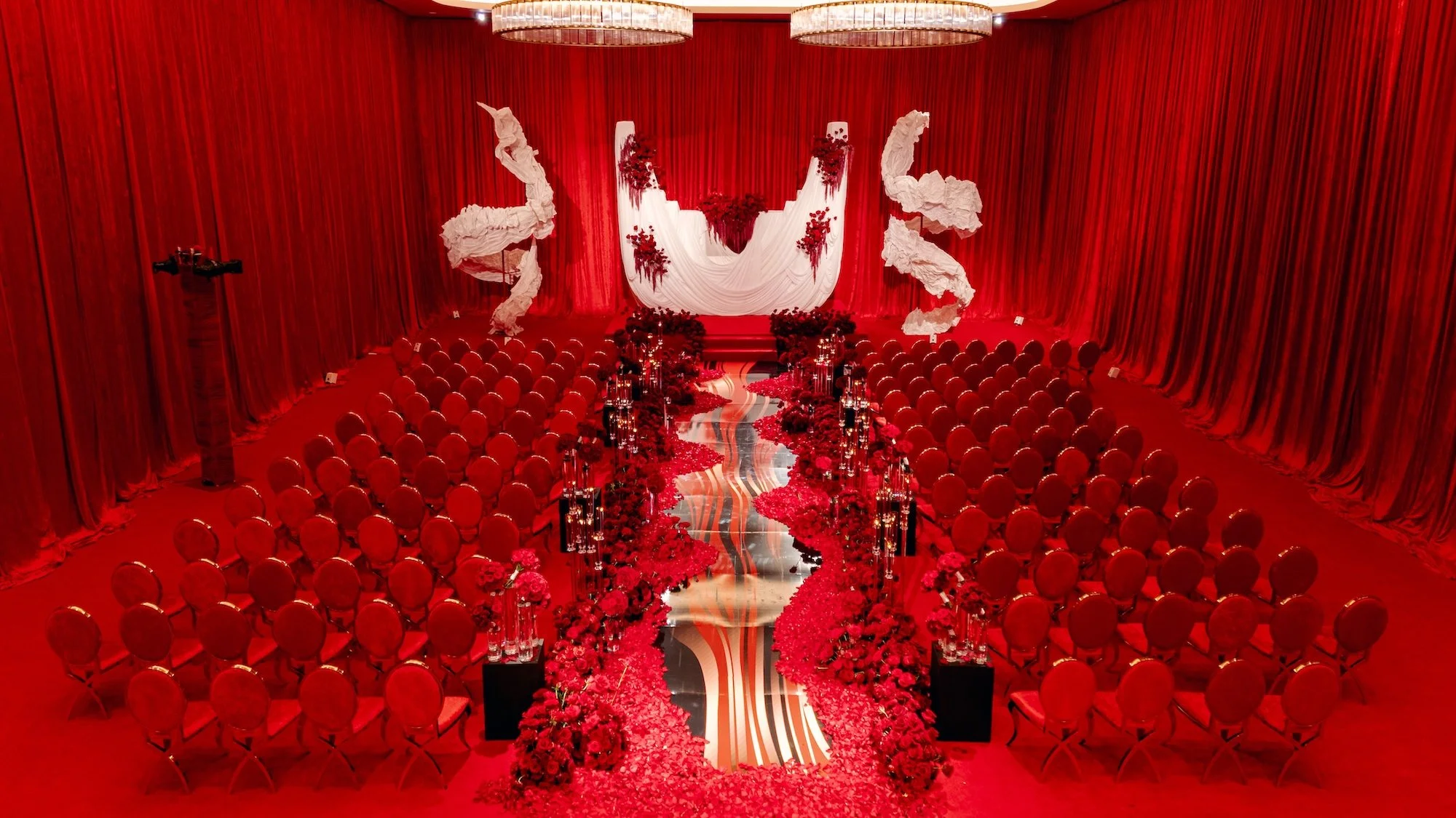 Romantic red wedding ceremony at Fontainebleau Las Vegas. Luxury Las Vegas Wedding Planner Andrea Eppolito.