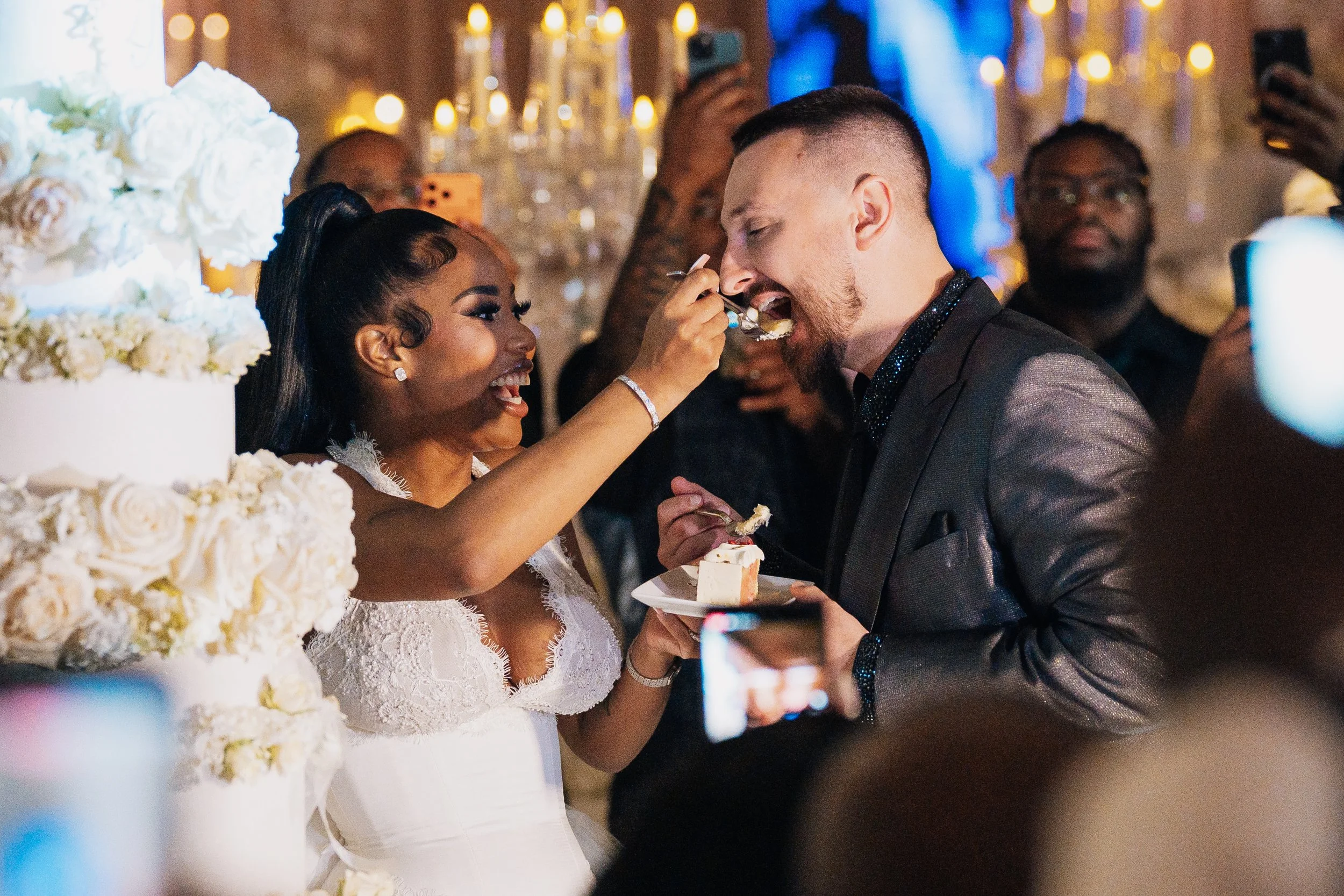 The bride feeds the groom 