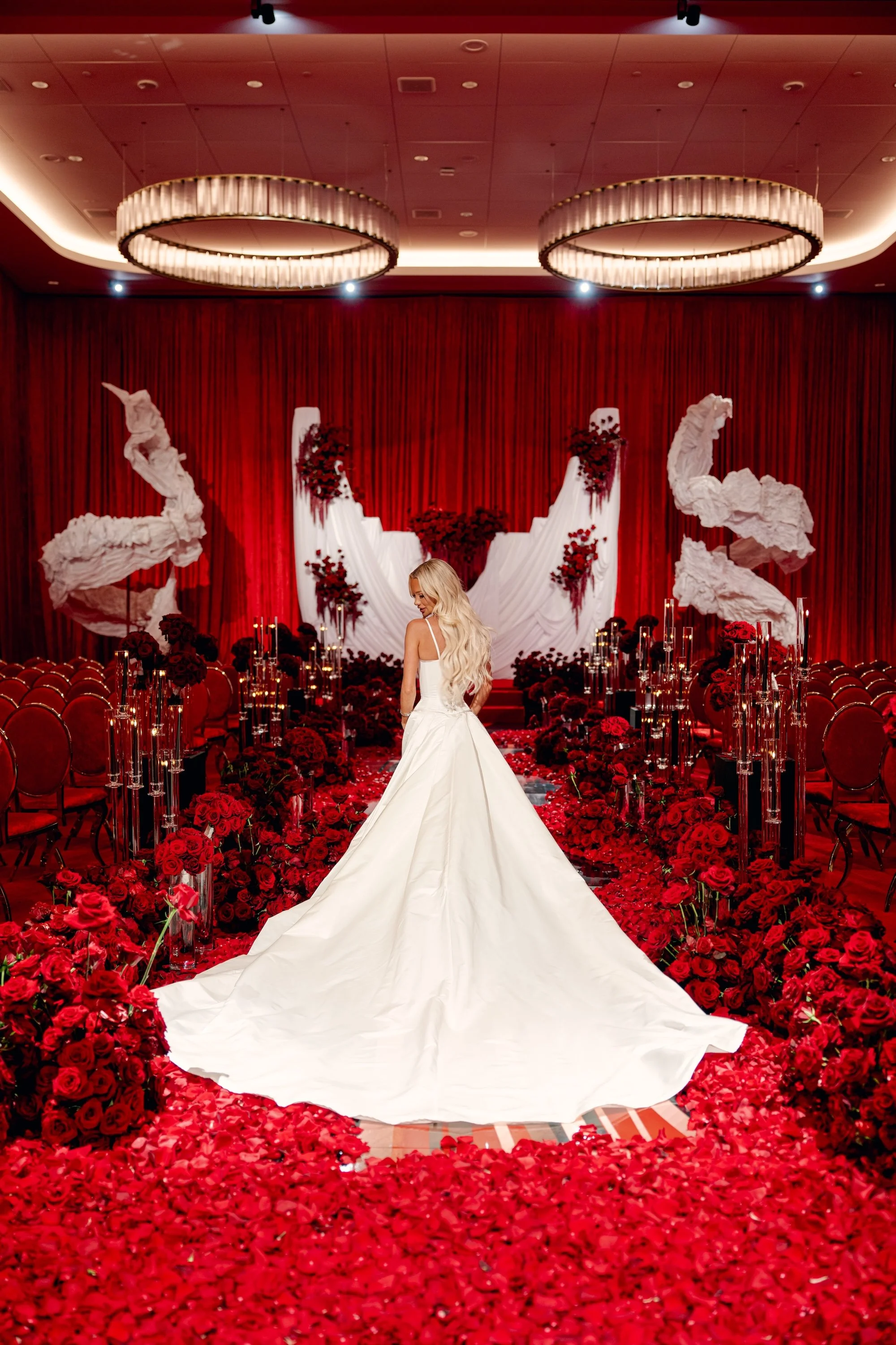Bride in Walter Mendez at romantic red wedding ceremony. Luxury Las Vegas Wedding Planner Andrea Eppolito.