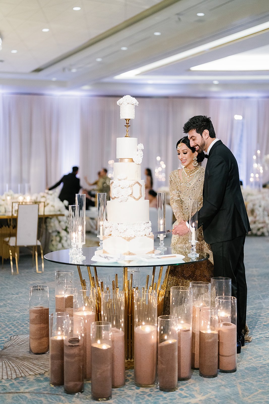 Bride and groom cut fairytale wedding cake