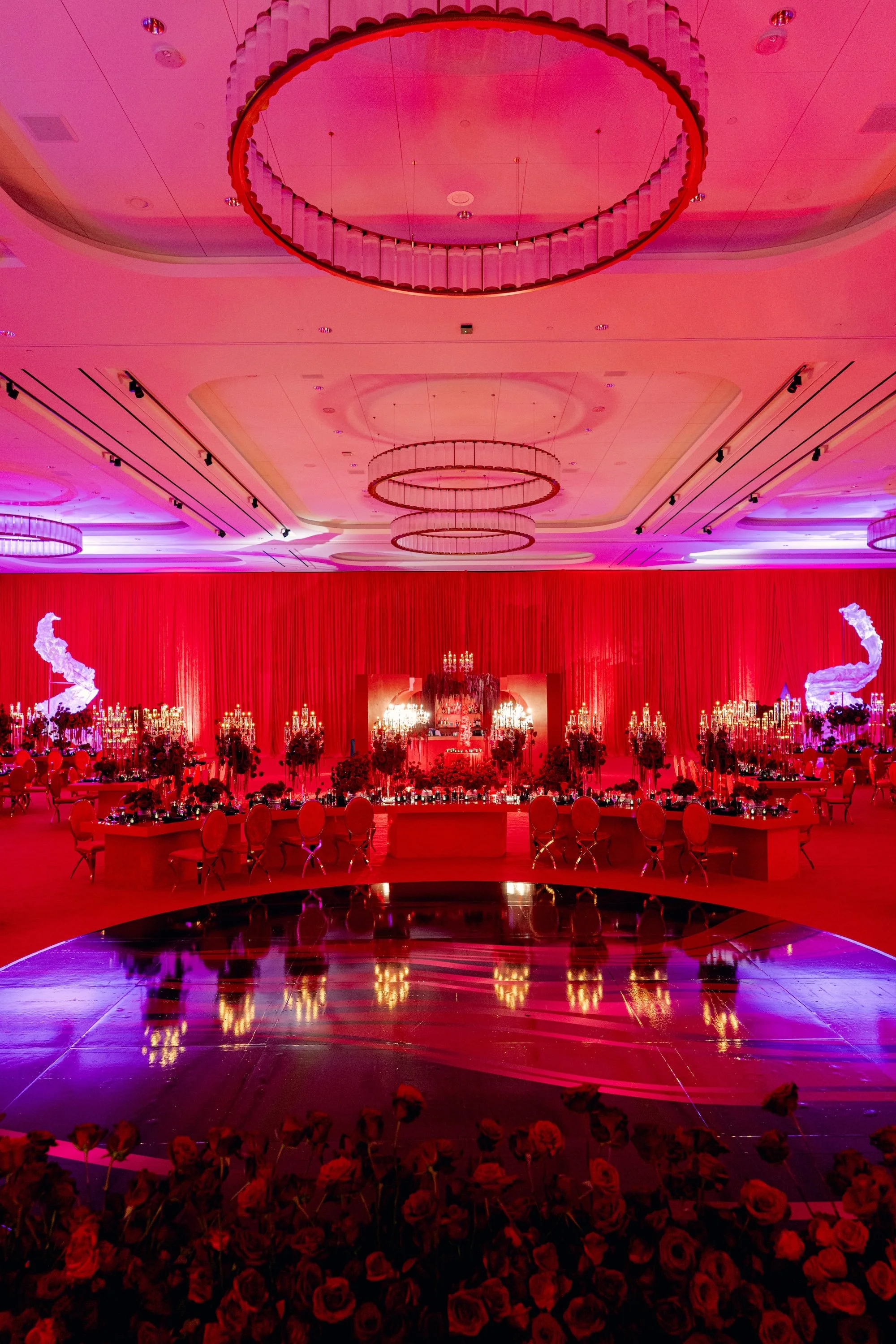 Red and black modern wedding reception at Fontainebleau Las Vegas.  Luxury Las Vegas Wedding Planner Andrea Eppolito.