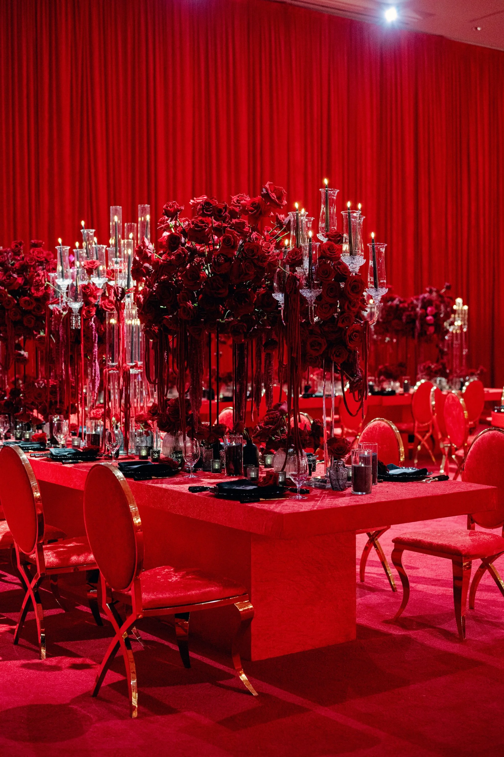 Oversized wedding centerpieces. Red and black modern wedding reception at Fontainebleau Las Vegas.  Luxury Las Vegas Wedding Planner Andrea Eppolito.