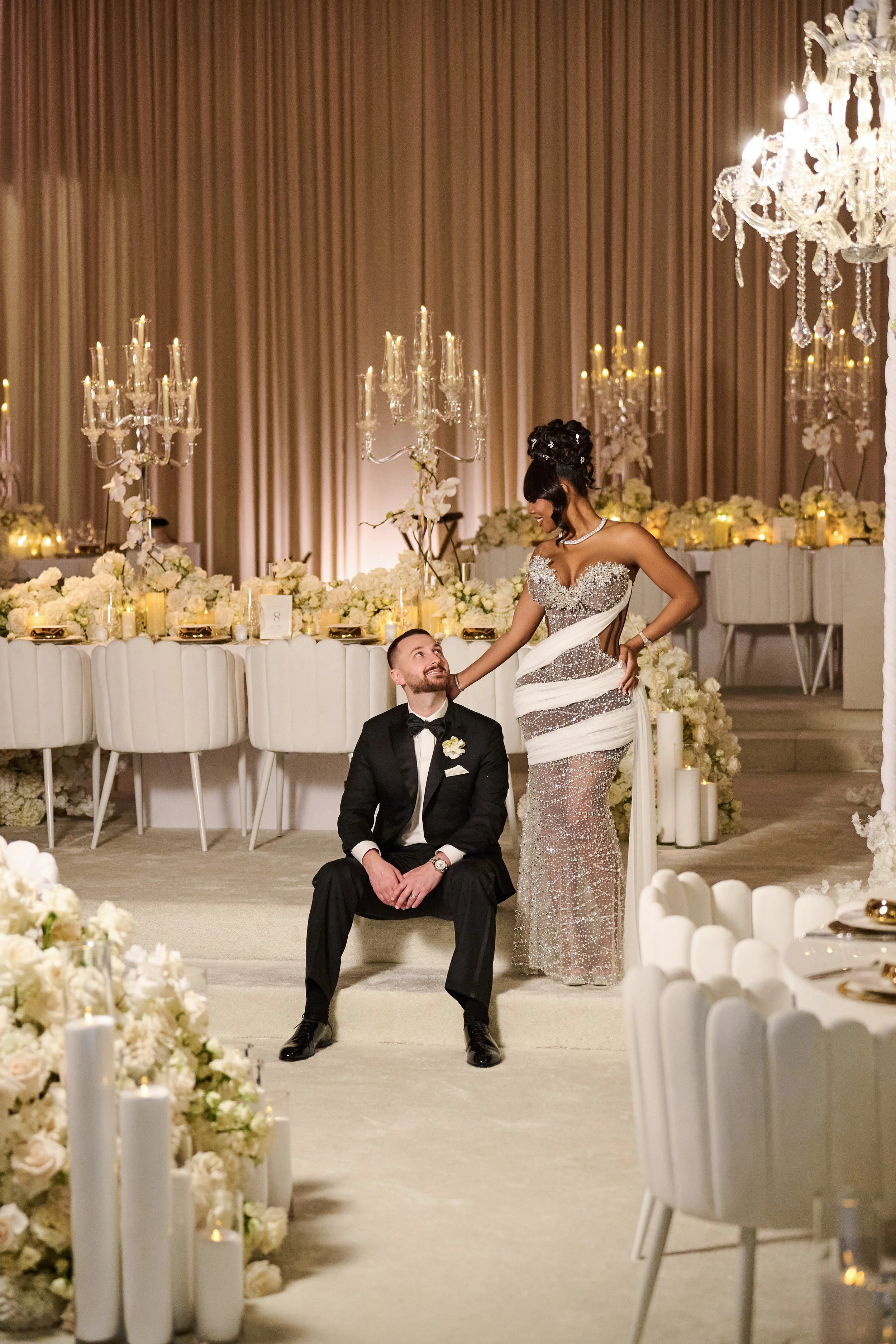 Bride and groom at multi level luxe wedding reception at ARIA Las Vegas