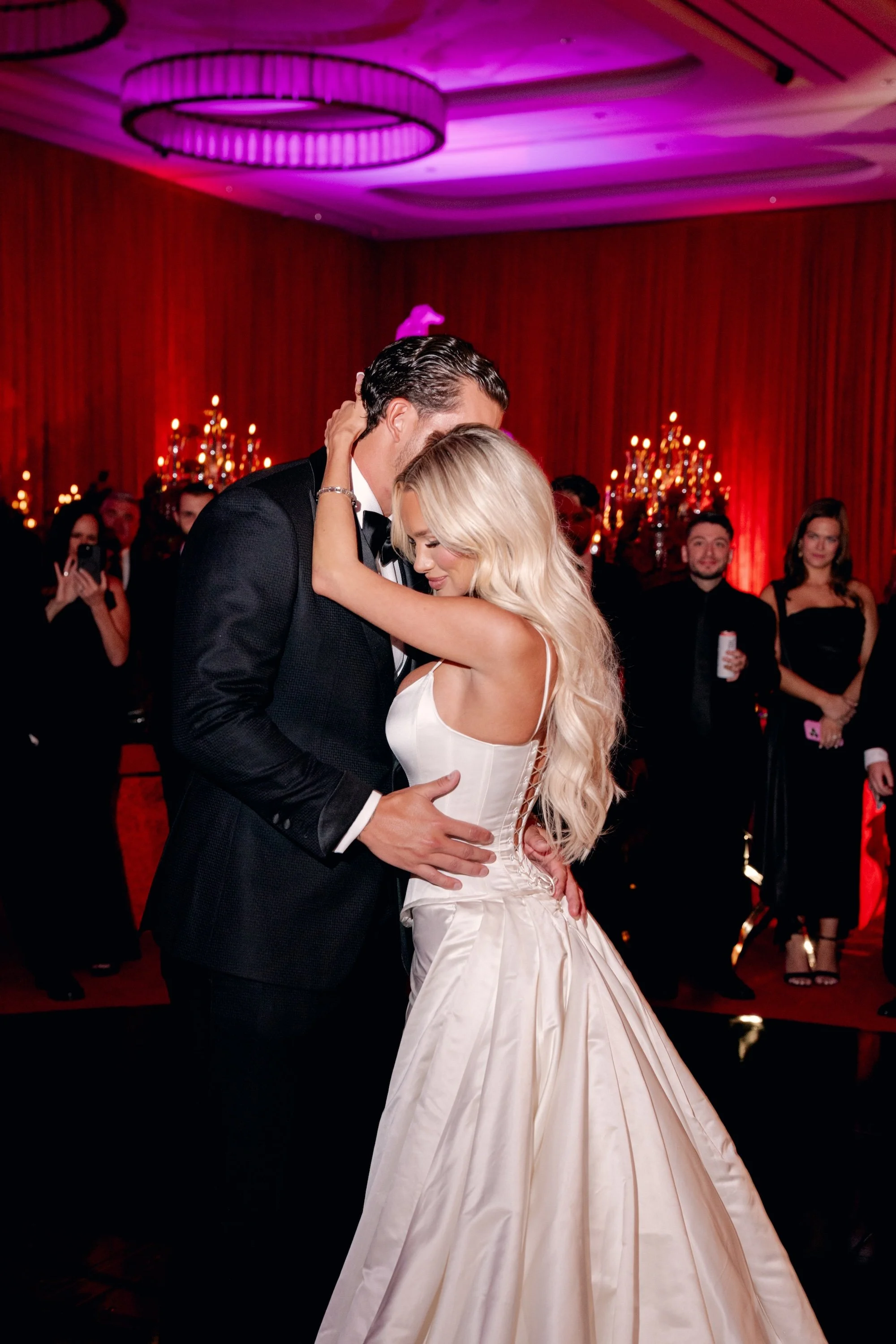 First dance. Red and black modern wedding reception at Fontainebleau Las Vegas.  Luxury Las Vegas Wedding Planner Andrea Eppolito.