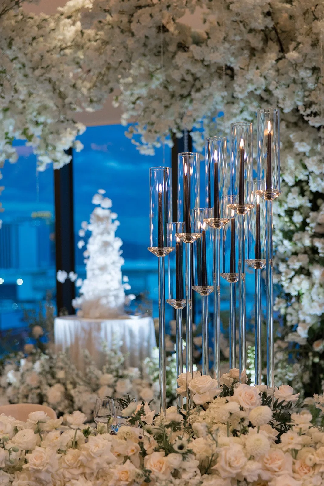 Wedding cake surrounded by flowers
