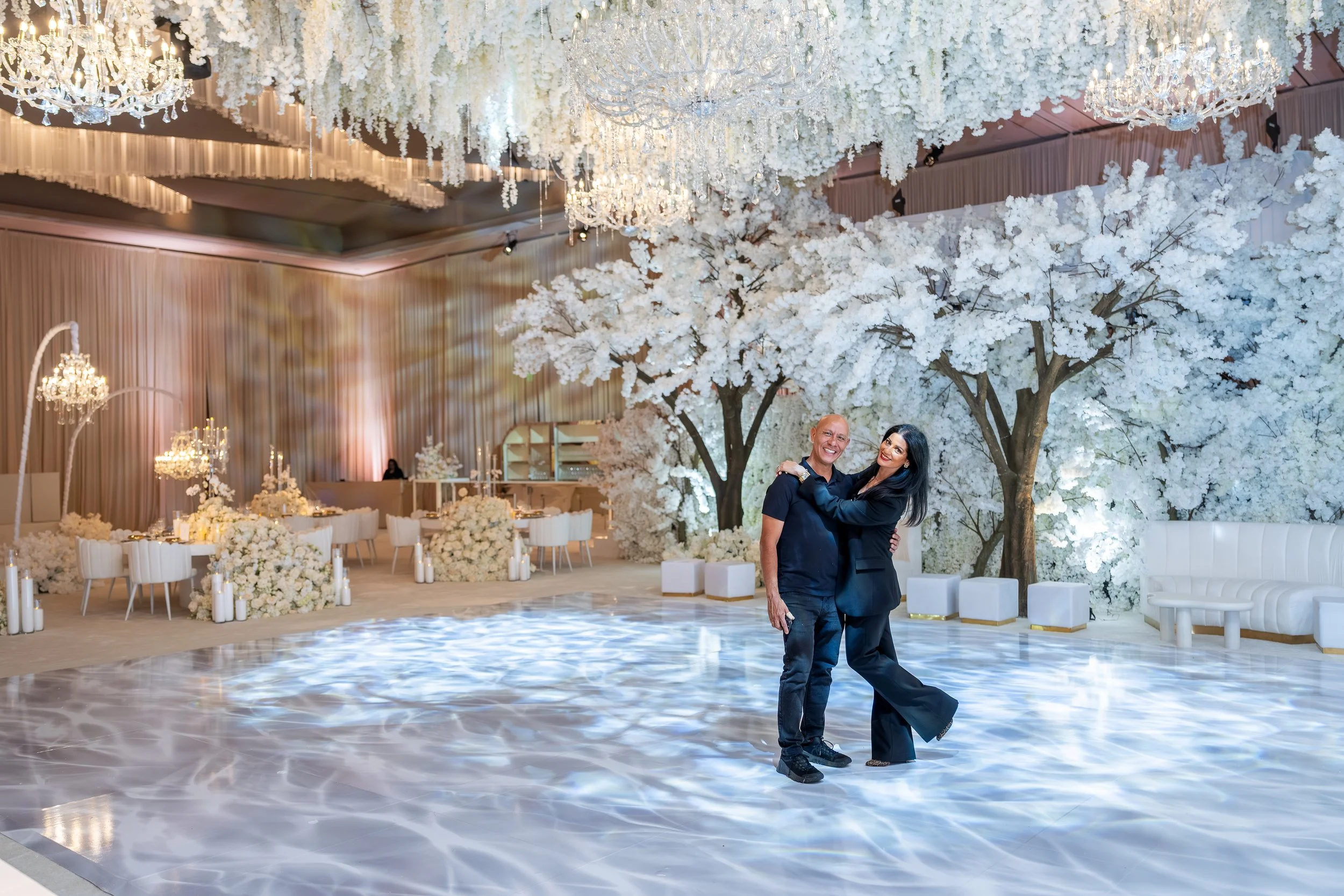 Luxury wedding planner Andrea Eppolito with the owner of Flowers by Edgar.