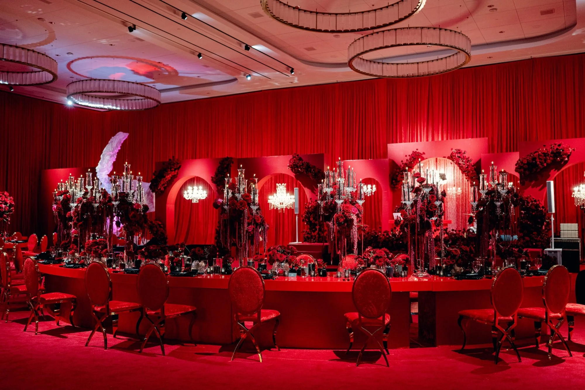 Red on red modern wedding reception at Fontainebleau Las Vegas.  Luxury Las Vegas Wedding Planner Andrea Eppolito.