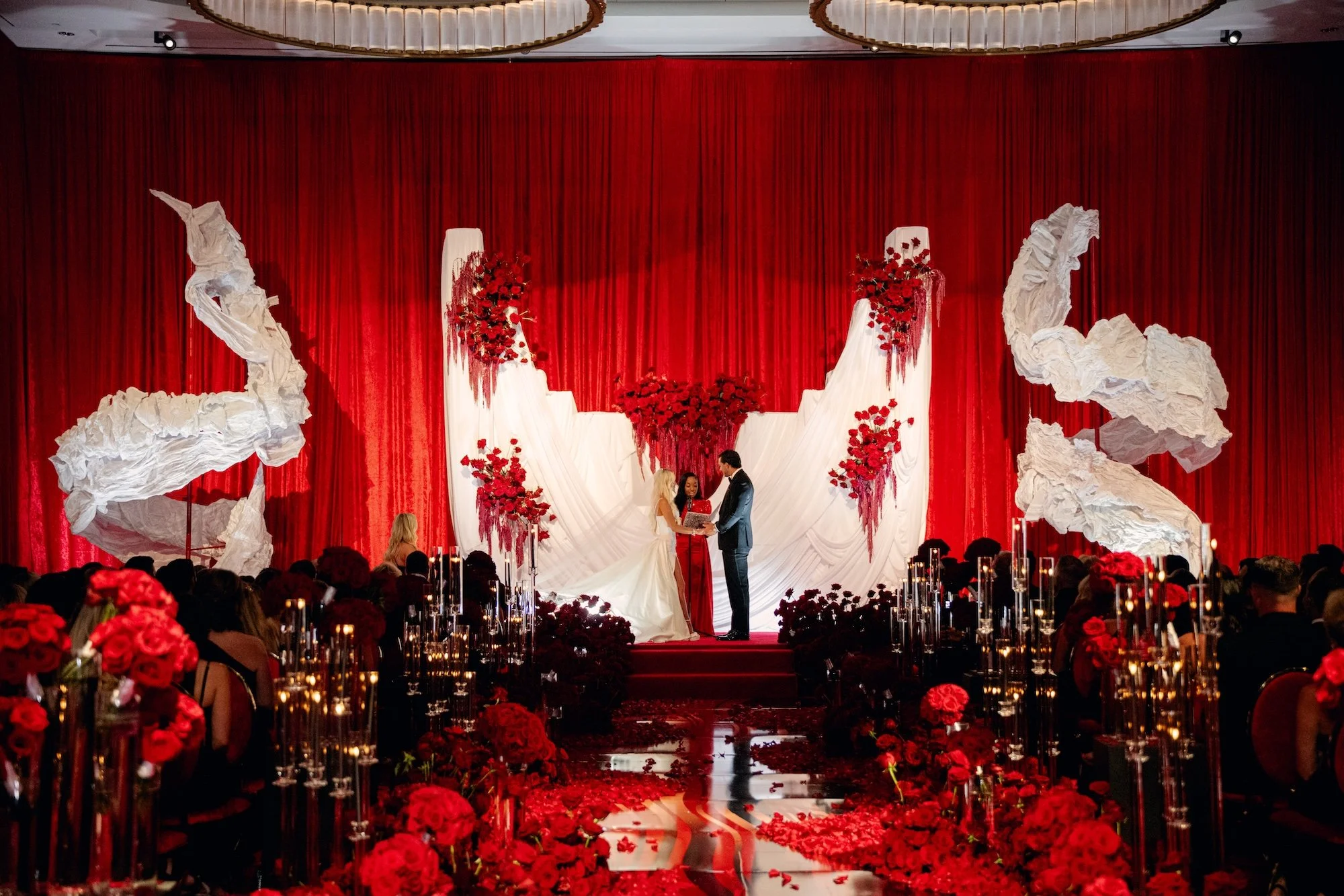 Luxe red and black wedding ceremony. Luxury Las Vegas Wedding Planner Andrea Eppolito.