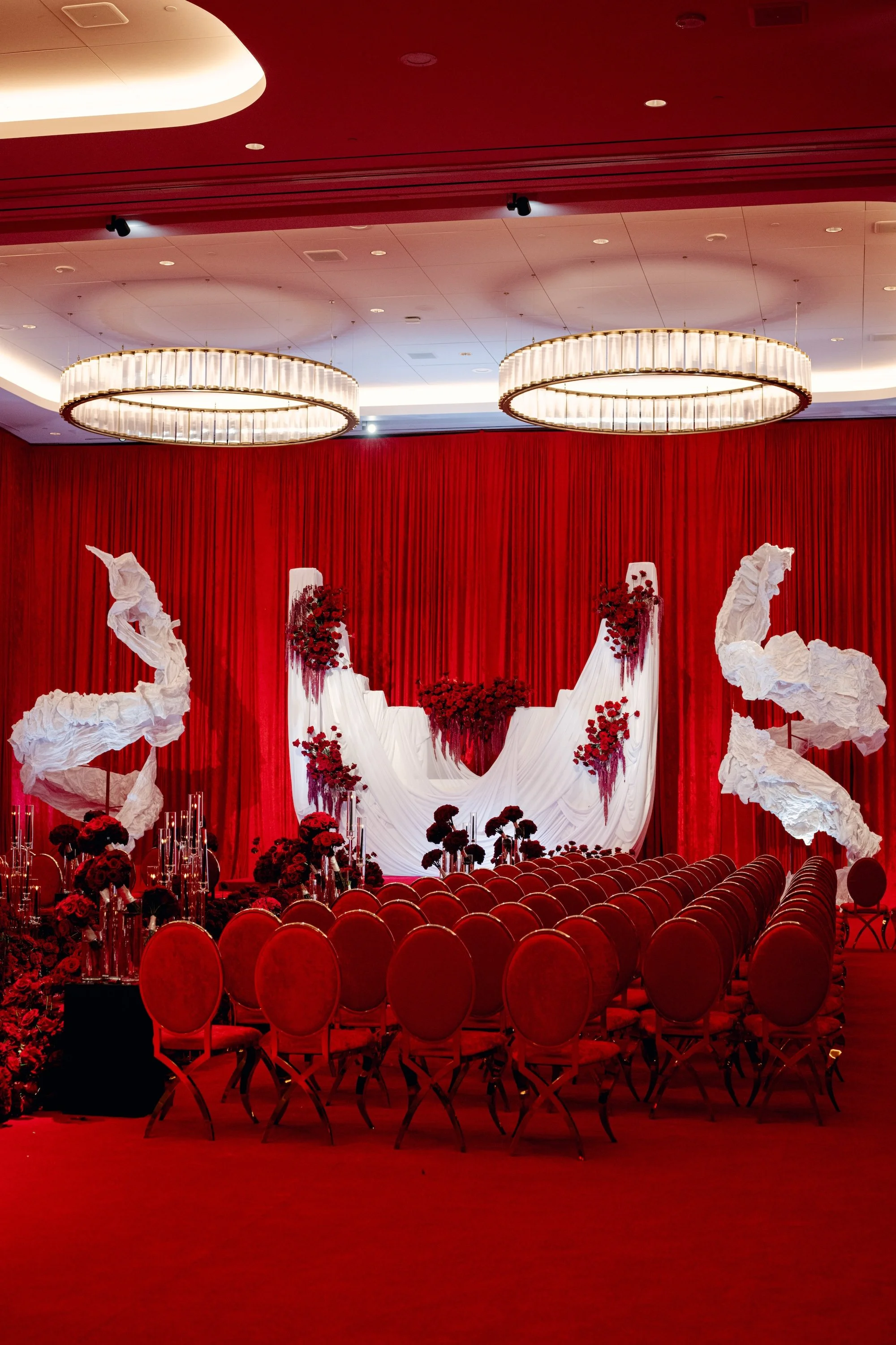 Red on red twin flames wedding ceremony. Luxury Las Vegas Wedding Planner Andrea Eppolito.