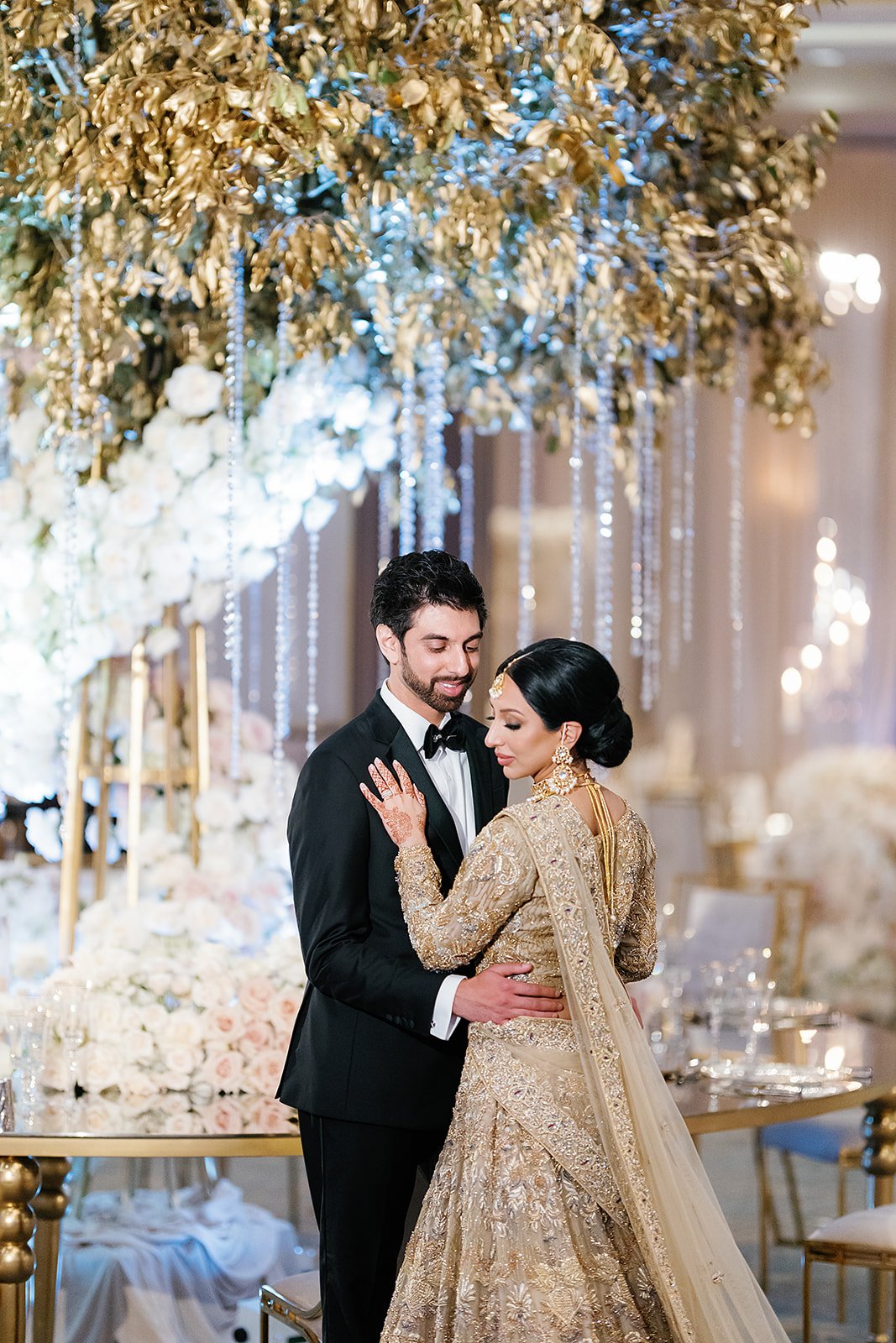 Indian bride and groom in luxe wedding reception