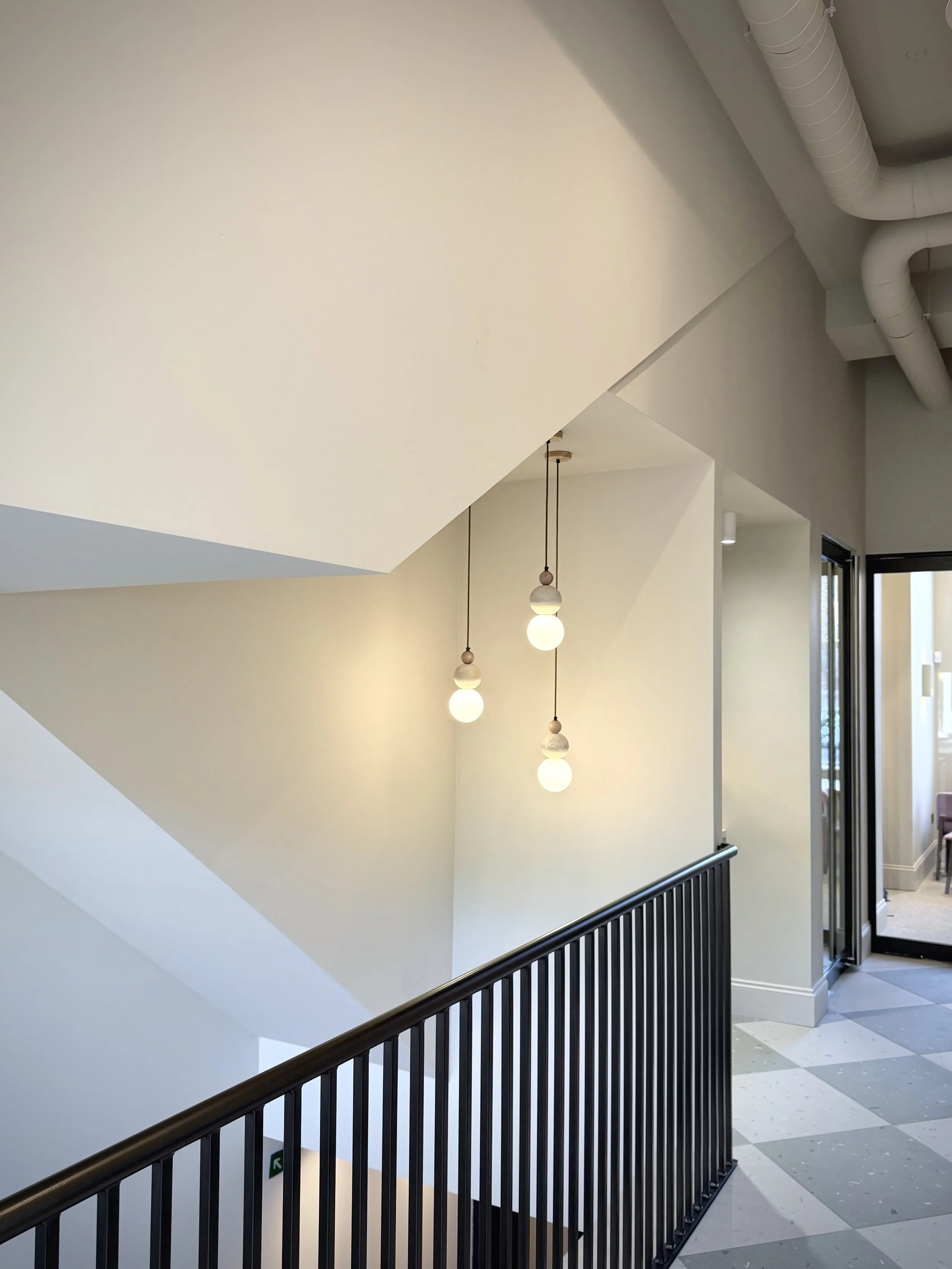 Interior photo of reception area with feature lighting