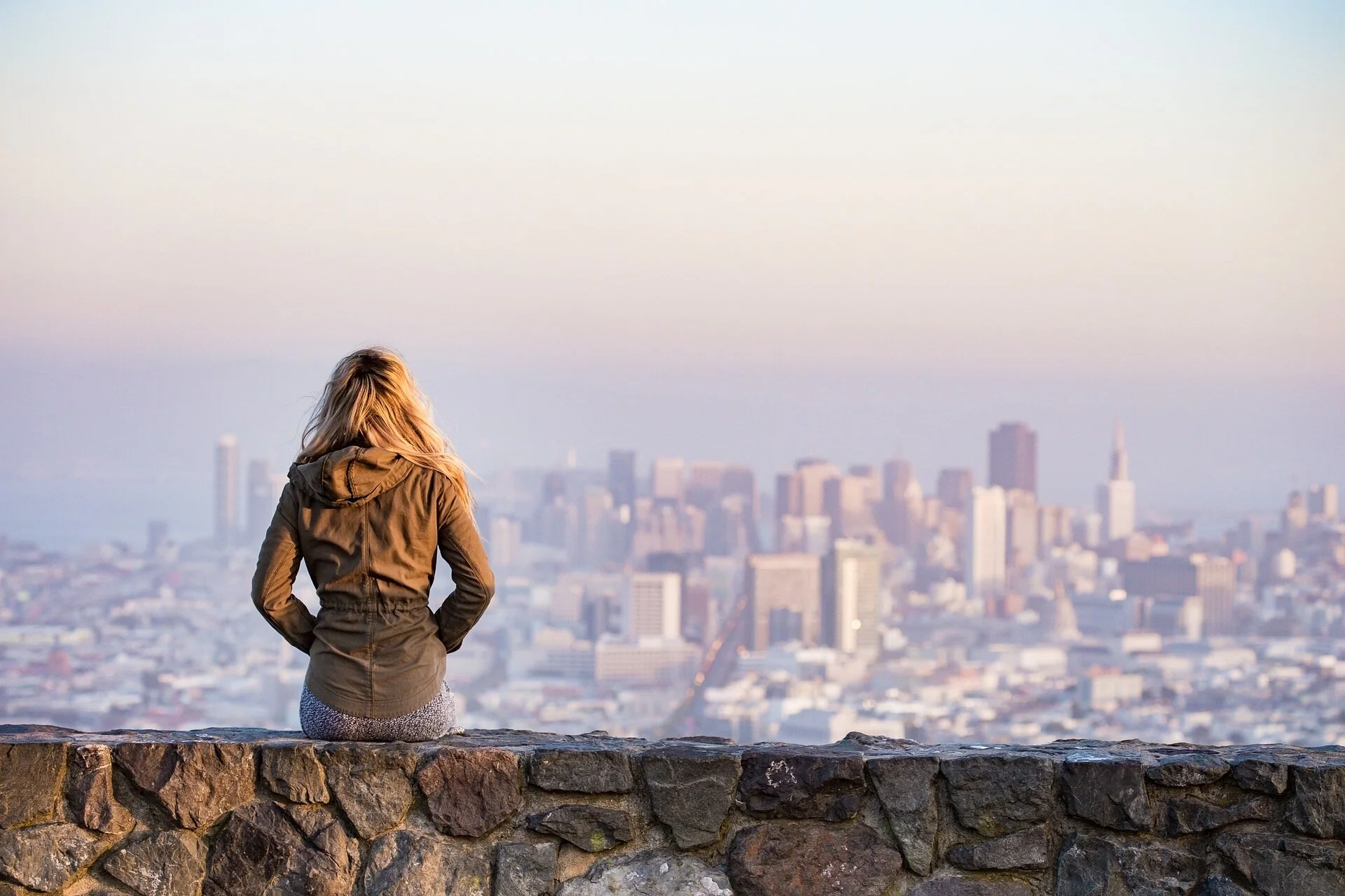 woman-overlooking-large-city.jpg