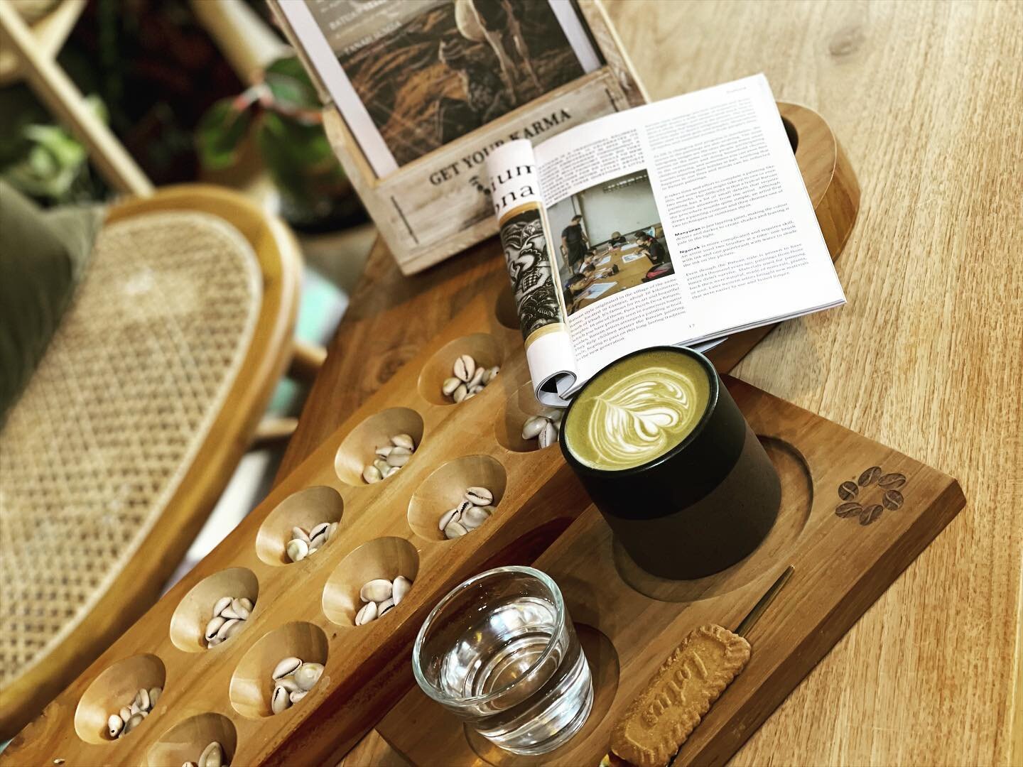 Alone or with friends, you&rsquo;ll always have us and @instantkarma.mag as company at Bloom
Pictured: dirty matcha latte with a traditional game of #congklakkayu 
. . . 
Caf&eacute; Bloom Bali
coffee | tea | pastries
#goodfood #goodmood 
Serving Mon