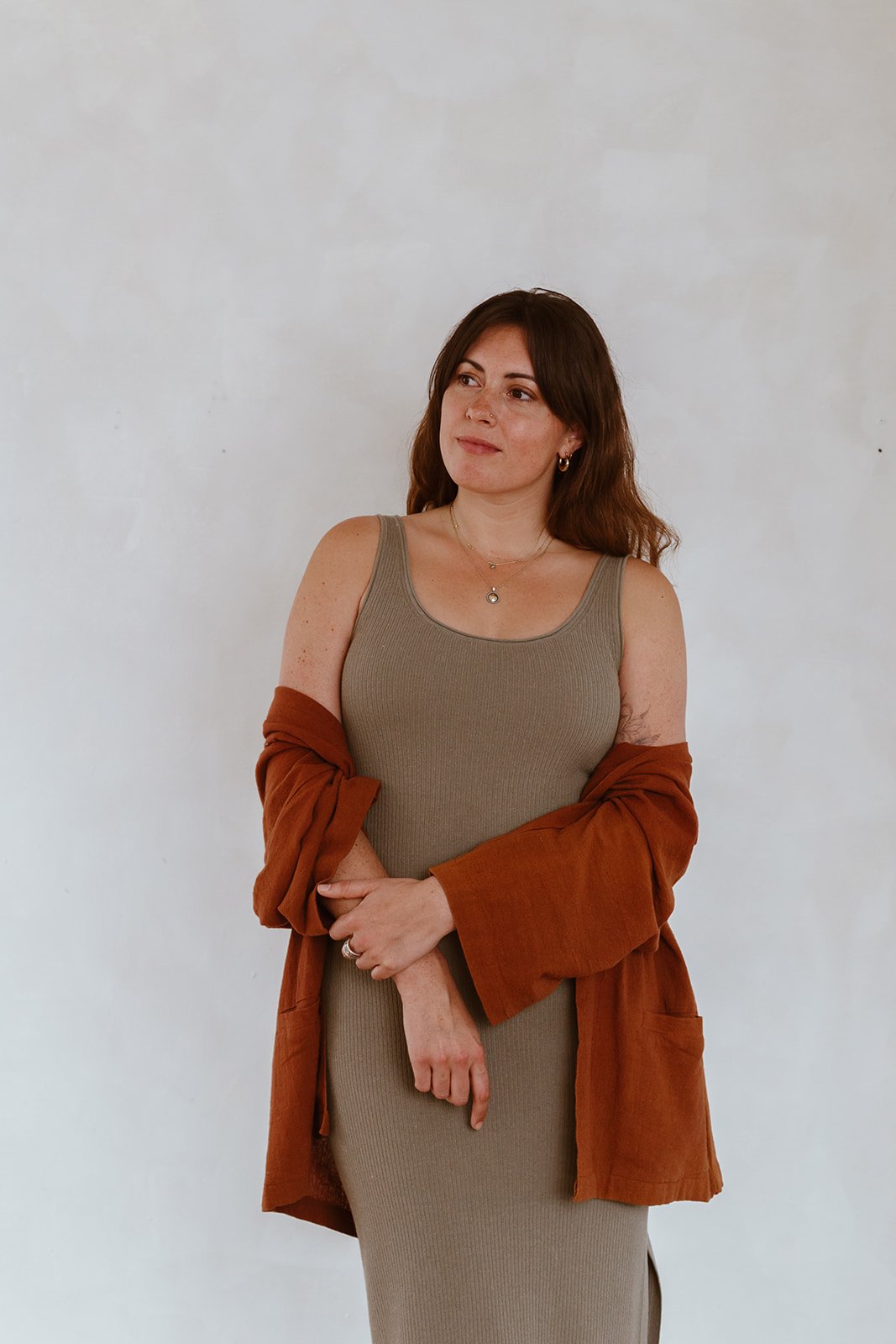 Confidence and self-esteem therapist in Bristol, standing in a warm studio setting