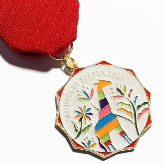 Fiesta medal for Audicles Hearing Services