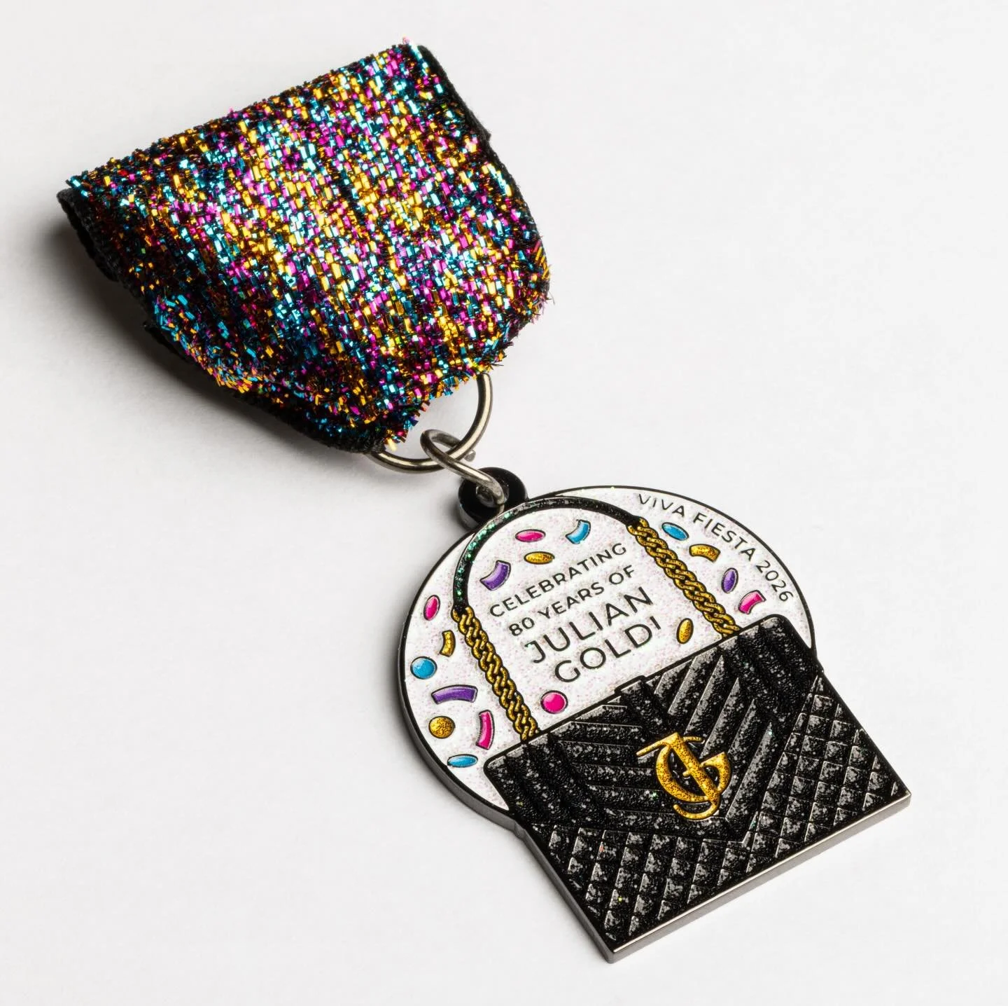 In true Julian Gold fashion &mdash; effortlessly elevated, endlessly chic. Core Creative was honored to once again design Julian&rsquo;s Gold Fiesta medal. Inspired by an iconic handbag silhouette, this year&rsquo;s medal shines in classic black, whi