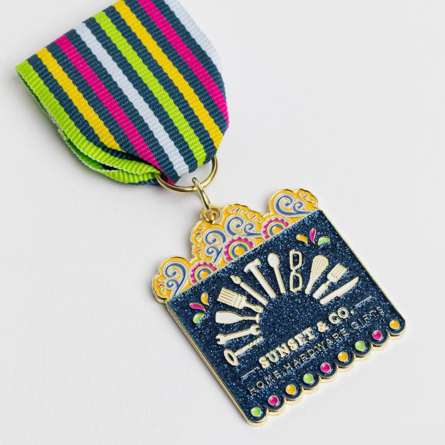 Core Creative was honored to once again design a Fiesta medal for a true community staple @sunsetandco.shop This year&rsquo;s design celebrates culture, color, and connection, featuring a vibrant papel picado shape, navy glitter detailing, and a bold