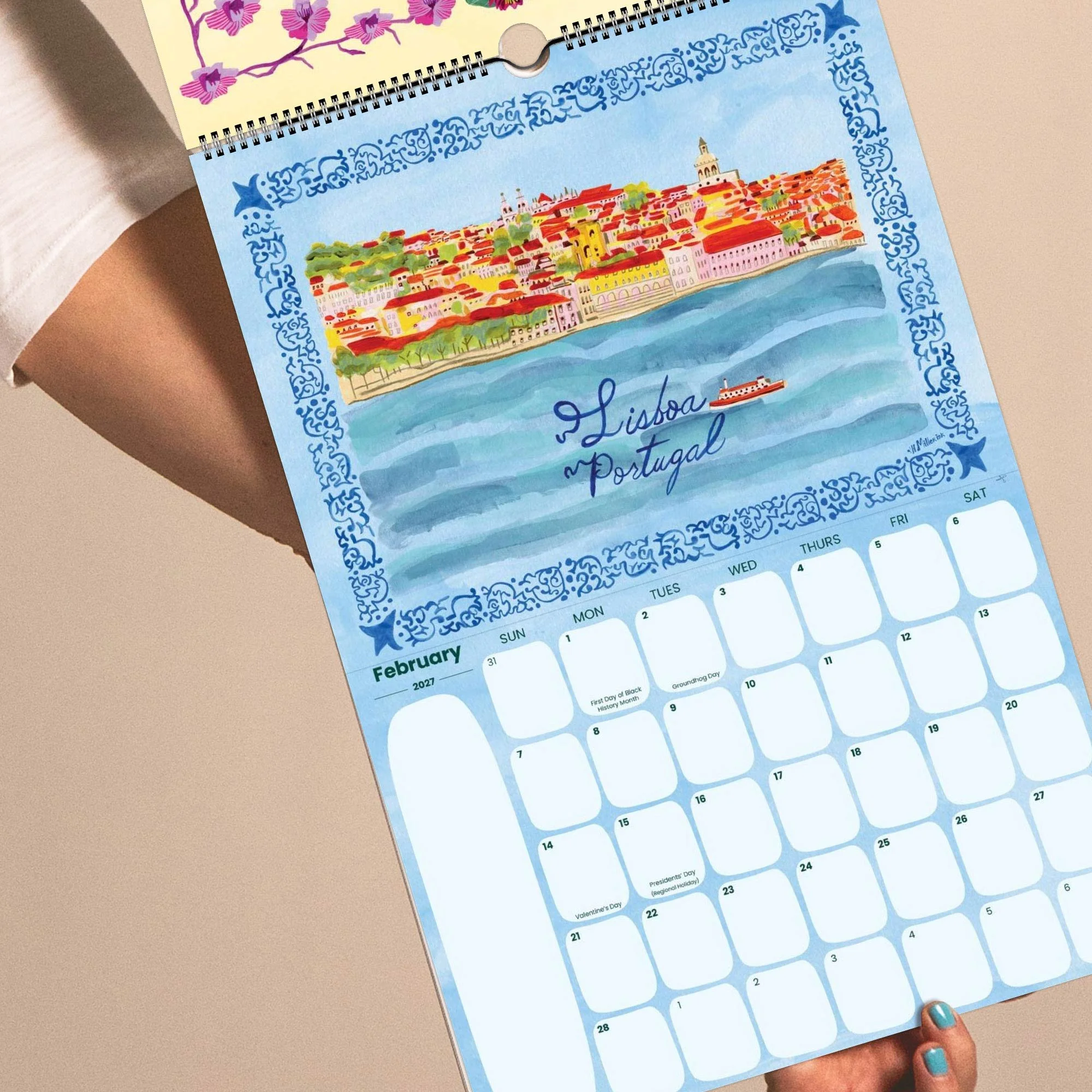 2027 Travel Wall Calendar featuring Lisbon, Portugal illustrations hand-drawn by illustrator Heather Miller.