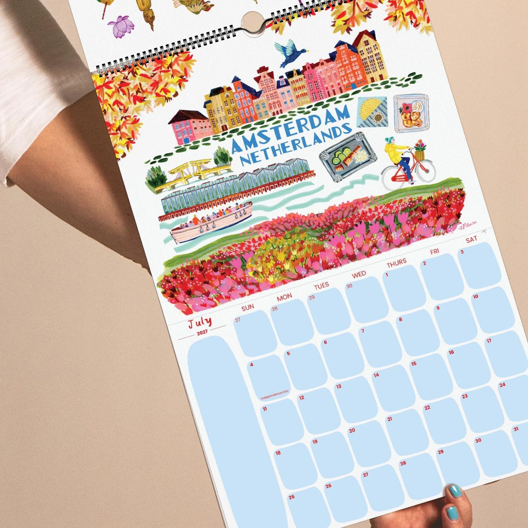 2027 Travel Wall Calendar featuring Amsterdam, Netherlands illustrations hand-drawn by illustrator Heather Miller.