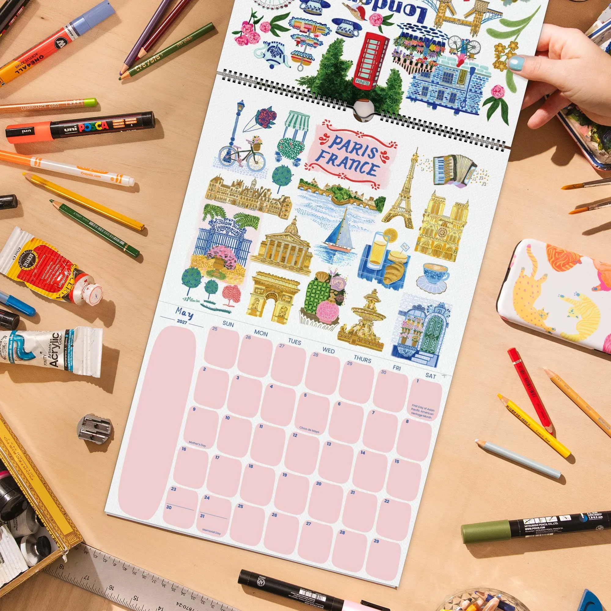 2027 Travel Wall Calendar featuring Paris, France illustrations hand-drawn by illustrator Heather Miller.