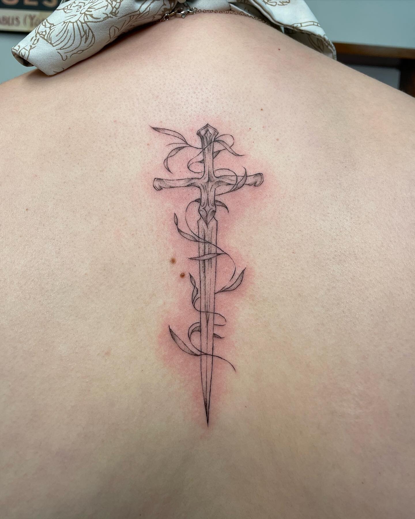 🗡️🌿 super excited about this sword for birchie 💖 obsessed with the placement! always the best! thank you forever! ✨🌀 #fineline #finelinetattoo #delicatetattoo #daintytattoo