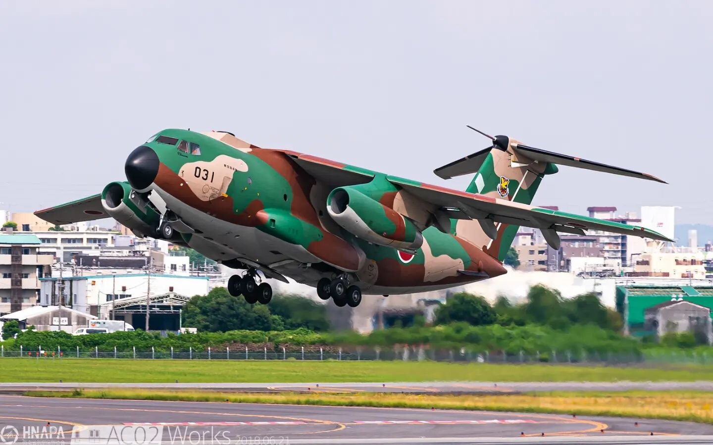 「Camouflaged in city」

A JASDF Kawasaki C-1 18-1031 from the 402nd Tactical Airlift Squadron is seen here taking off from Osaka Itami Airport, Japan in 2018. It's the closest airport to Osaka's city centre which handles domestic traffics.

I remember