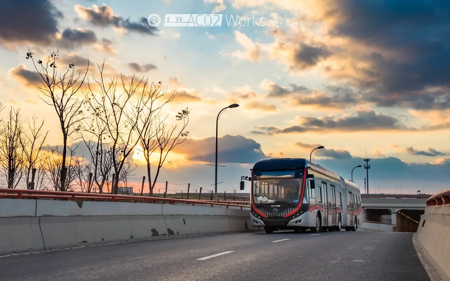 「Sunset test run」

Here's a Yutong ZK5180A 18m trolleybus (in battery-powered mode) doing a test run in Hongqiao Central Business District, Shanghai at sunset, preparing for the opening of Route 71 e-BRT service in early 2017.

====================
T