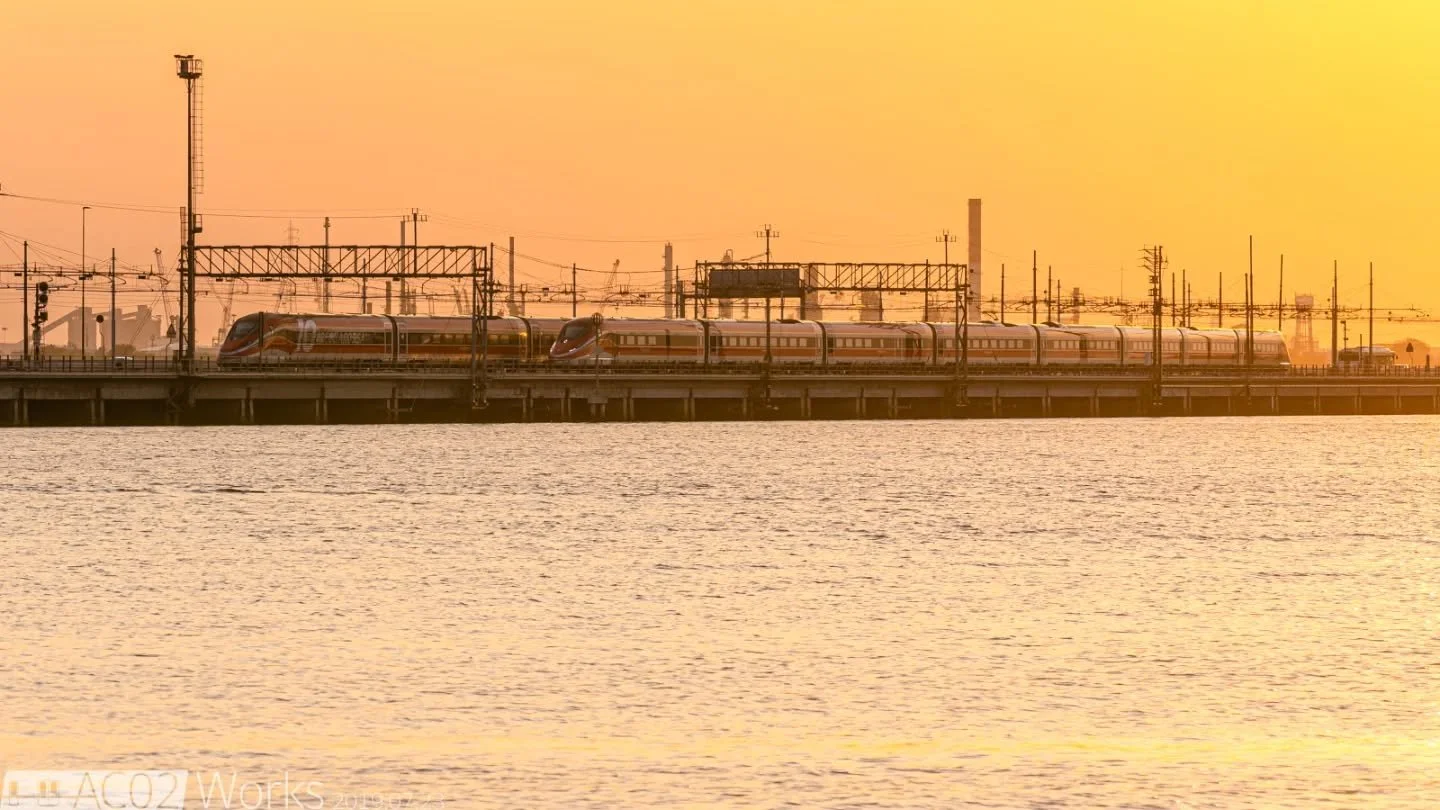 「Tramonto a Venezia」

Here are two Frecciarossa (means &quot;red arrow&quot;) ETR 1000 EMUs (built by Bombardier and AnsaldoBreda) operated by Trenitalia meeting just outside Venezia Santa Lucia railway station over the lagoon in a beautiful sunset. 