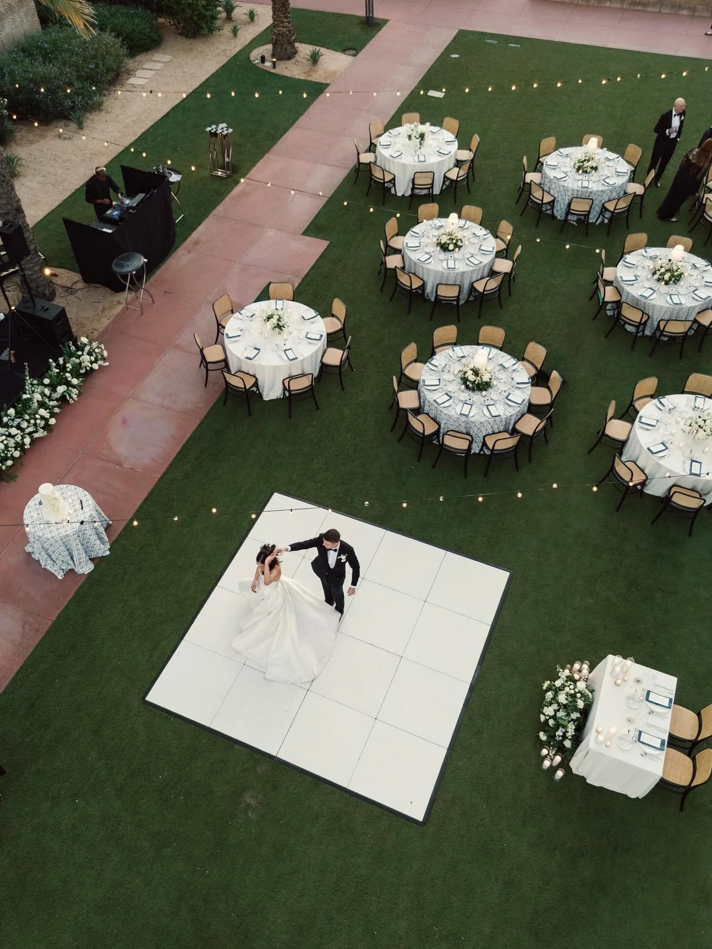 We are still OBSESSED with the aerial view of this gorgeous wedding. The clean white dance floor is proof that sometimes the simplest backdrops let the most beautiful moments shine bright✨

#azweddingvendors #dancefloorrental #weddinglayout #arizonav