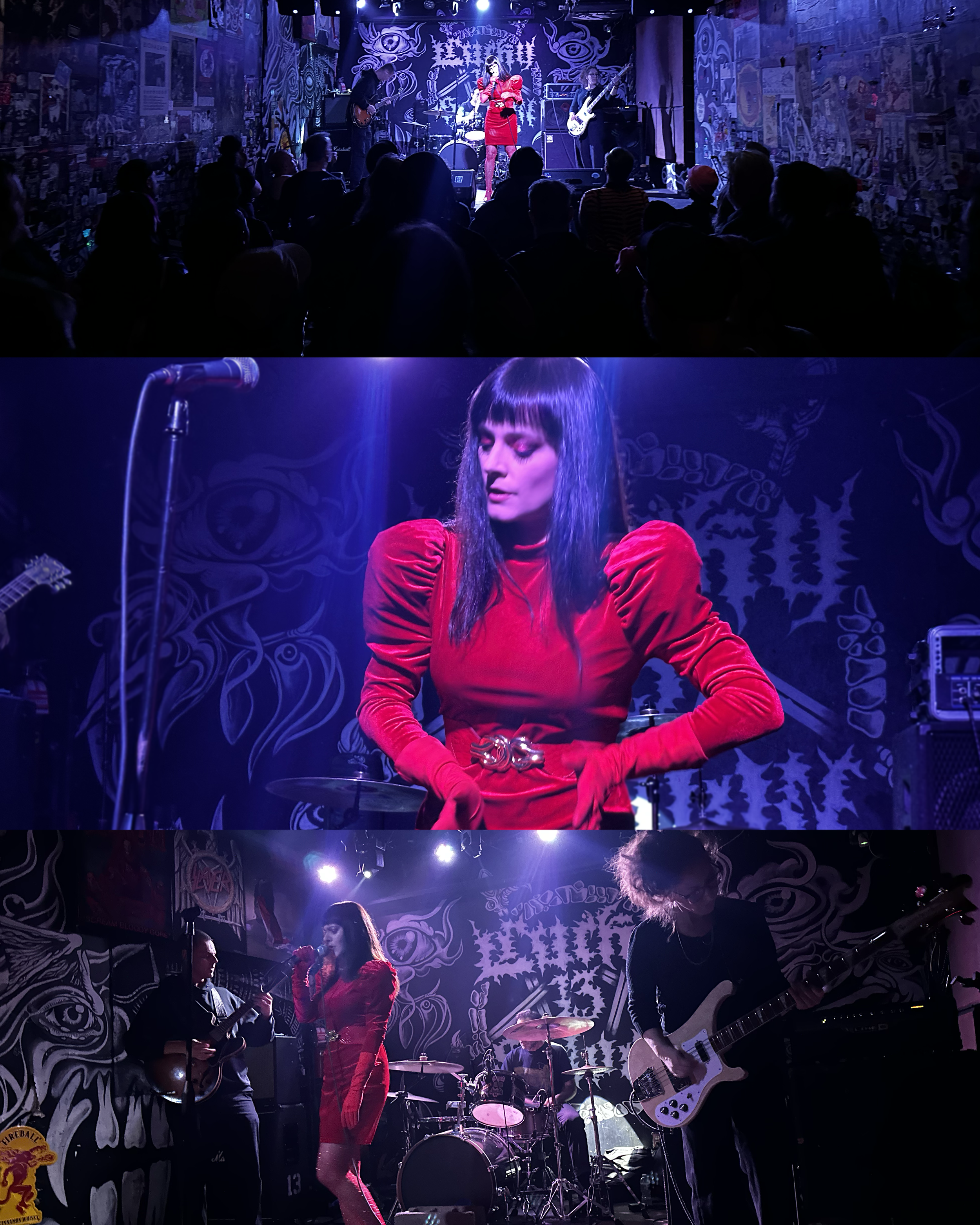 A live band performing on stage, with lead singer in a red dress, surrounded by purple and blue lighting, and an audience watching.