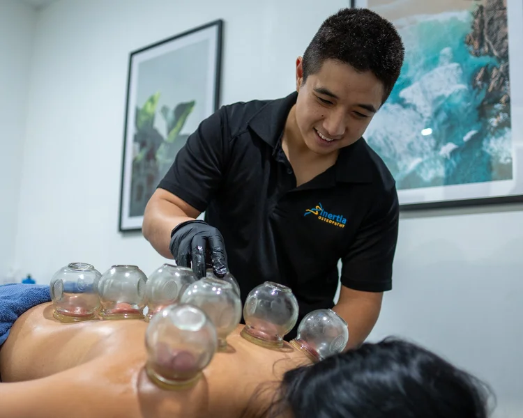 Cupping on a patient's back