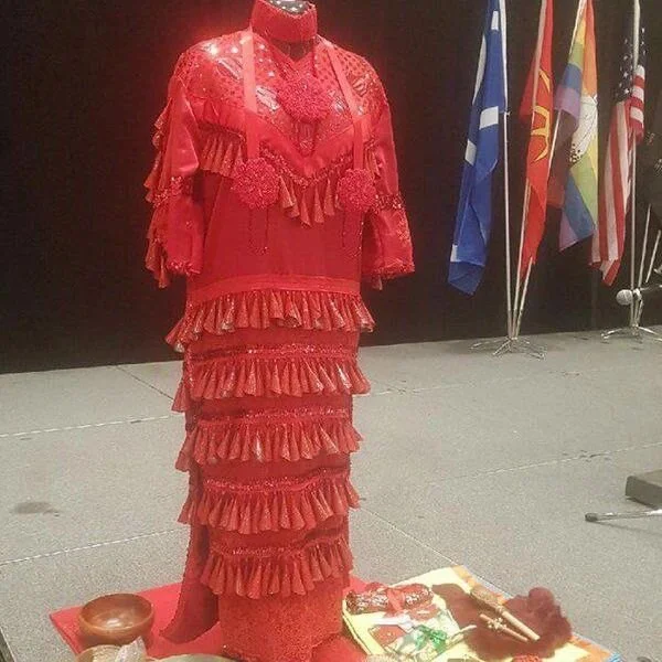Red Dress Day is May 5th honouring and remembering 1200+ missing and murdered Indigenous women girls and 2SLGBTQI+ people in Canada. People are encouraged to wear a red dress, display red dresses in public spaces, or put a red light outside their doo