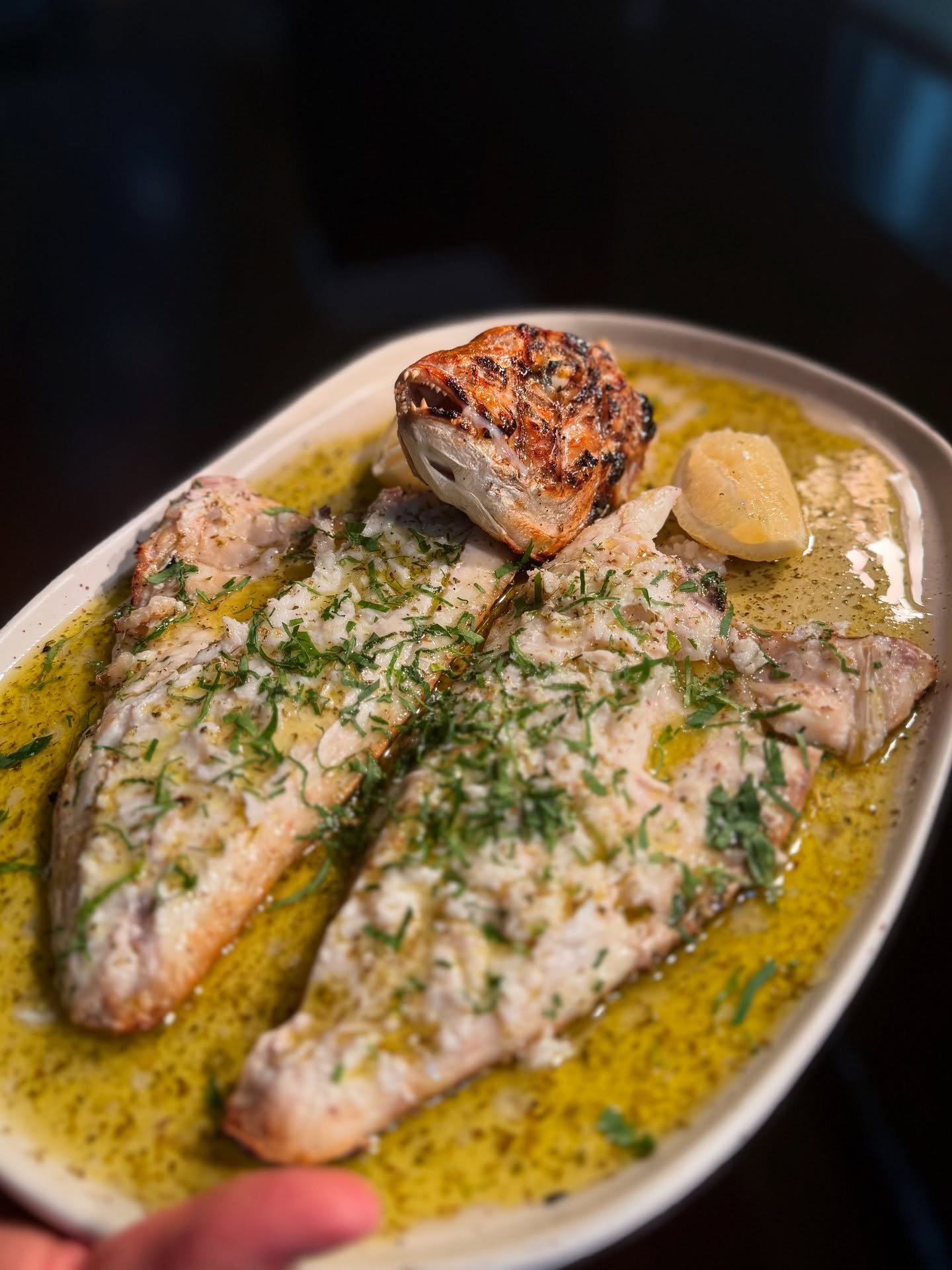 Serving market-fresh snapper tonight — butterflied and deboned, finished with a classic Greek sauce of lemon juice & olive oil 🇬🇷