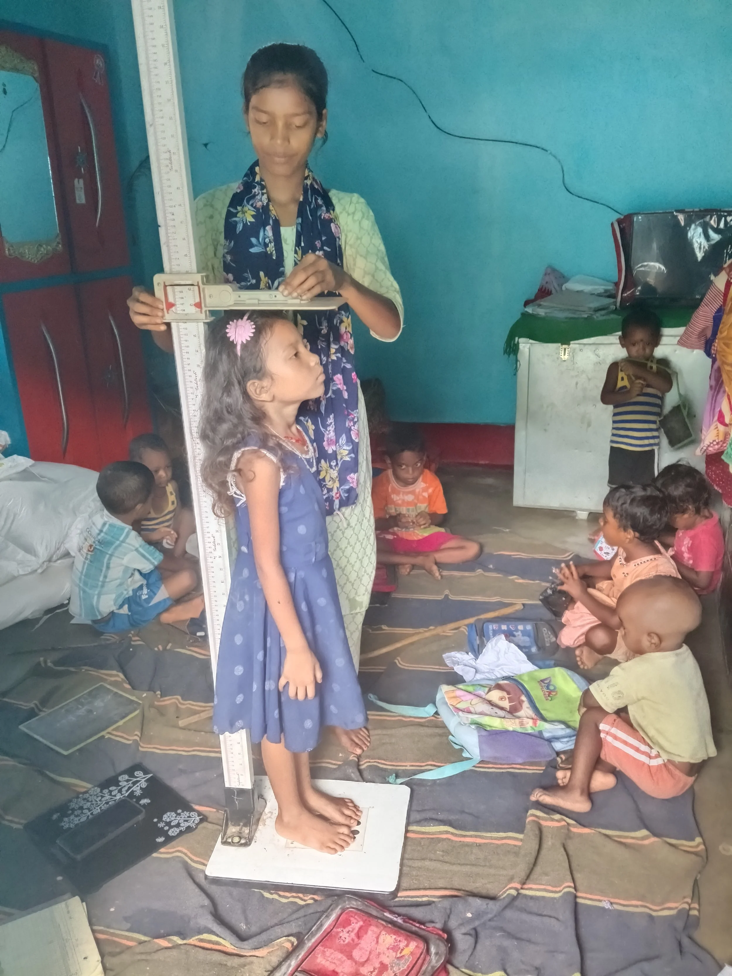 Copy of SS Chameli Kumari conducting growth monitoring in the Anganwadi of Mishirhotag.jpg