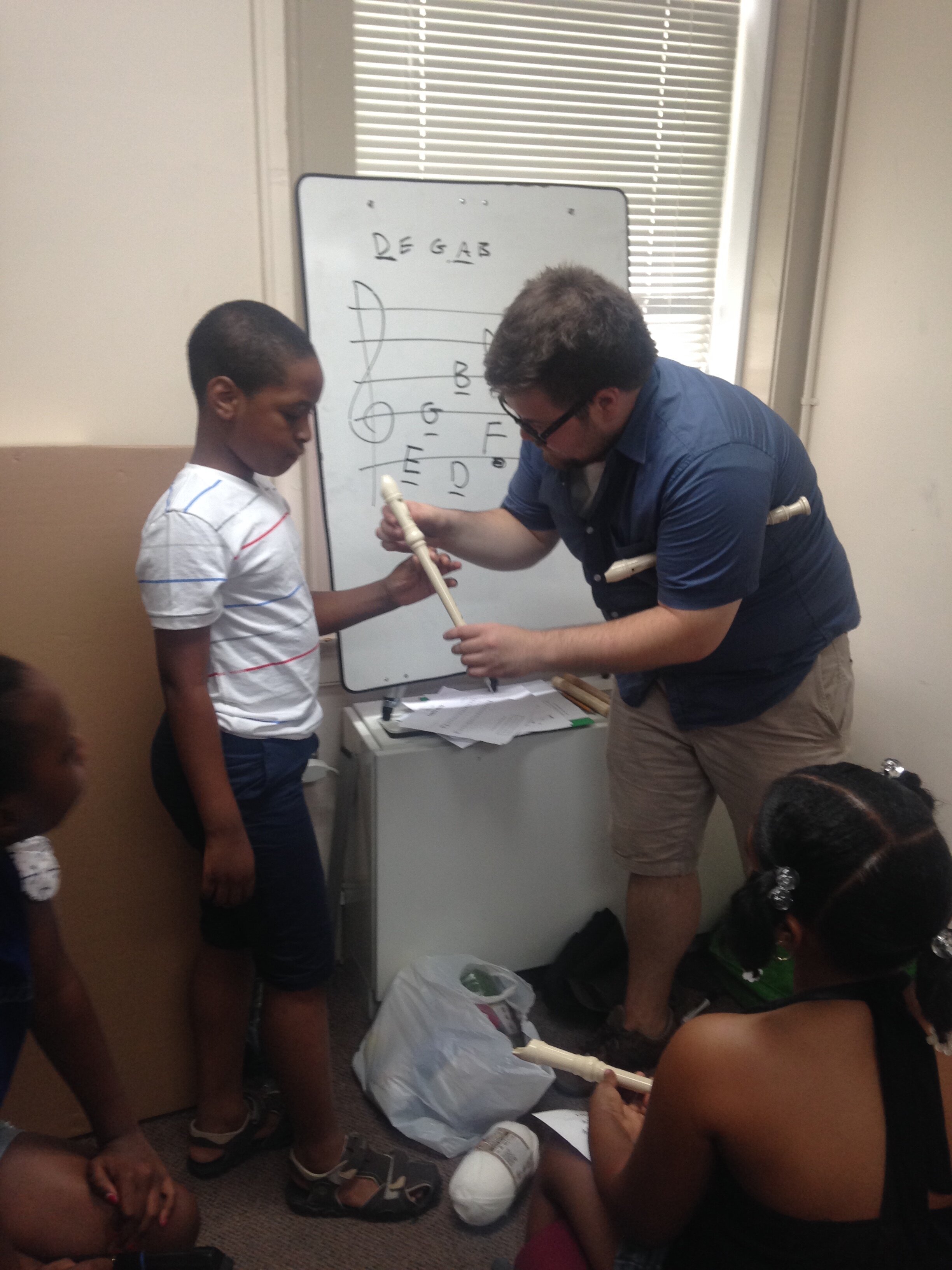 Instructor Brad teaching a beginner recorder class