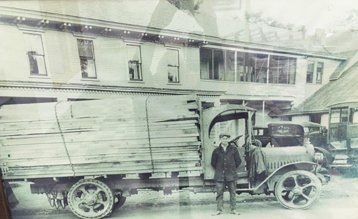  This is Doug and Greg's grandfather, Robert Gay who owned a trucking firm called R.L. Gay Express. This is quite a load of lumber!  With today's standard’s you would need three straps to hold this load down. 