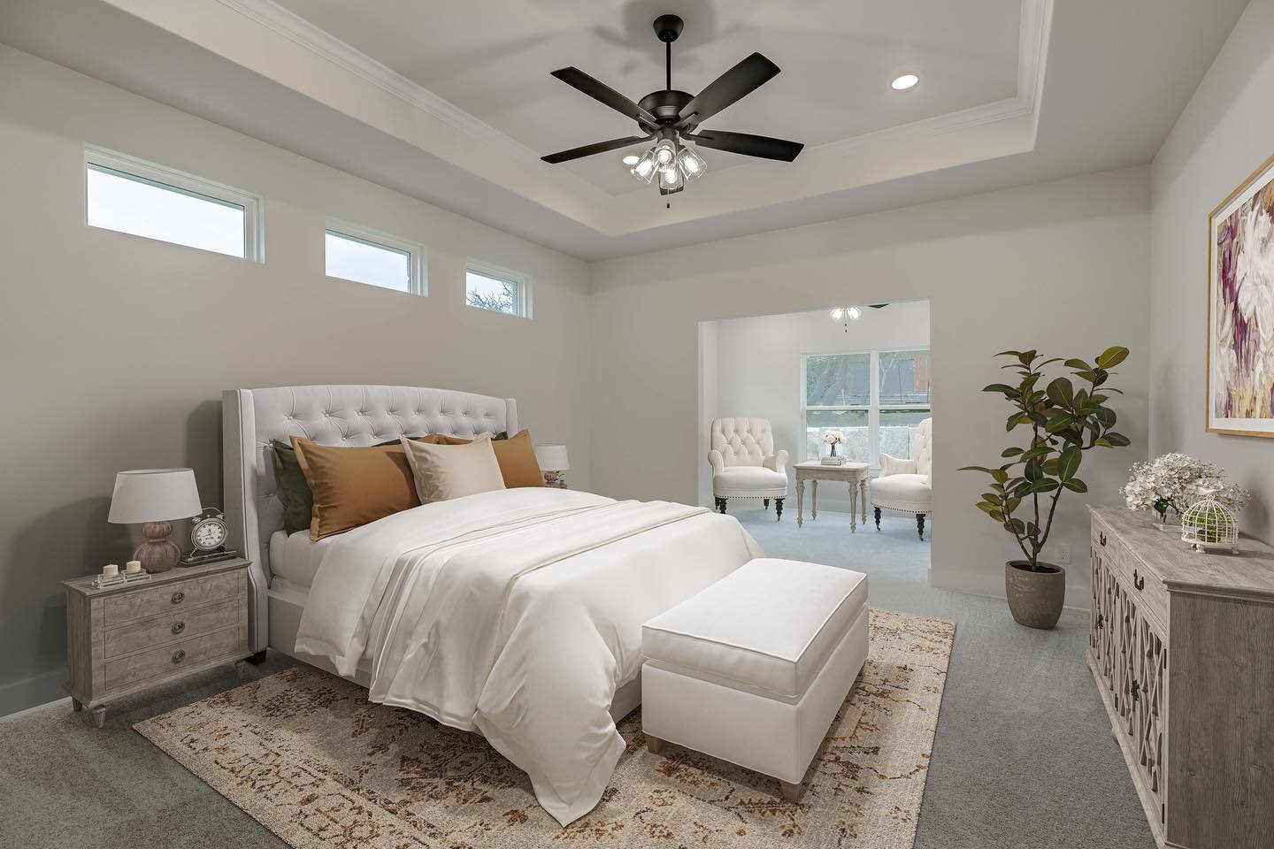 Stunning primary bedroom in 2016 Chalet Circle! Plush carpeting, tray ceilings, and a sitting room make this a true primary retreat! 

(This photo is virtually staged) 

#kerrville #keptclassichomes #themeridian #hillcountry #newhome #construction #a