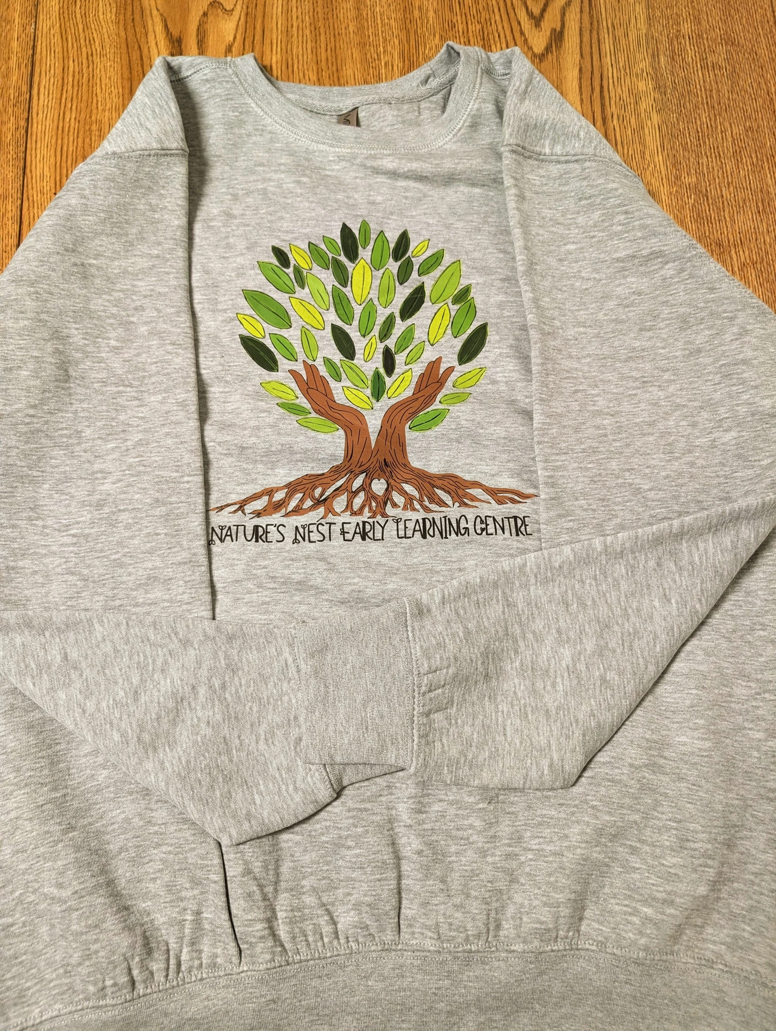 Nature's Nest Early Learning Centre Logo Crewneck - Unisex