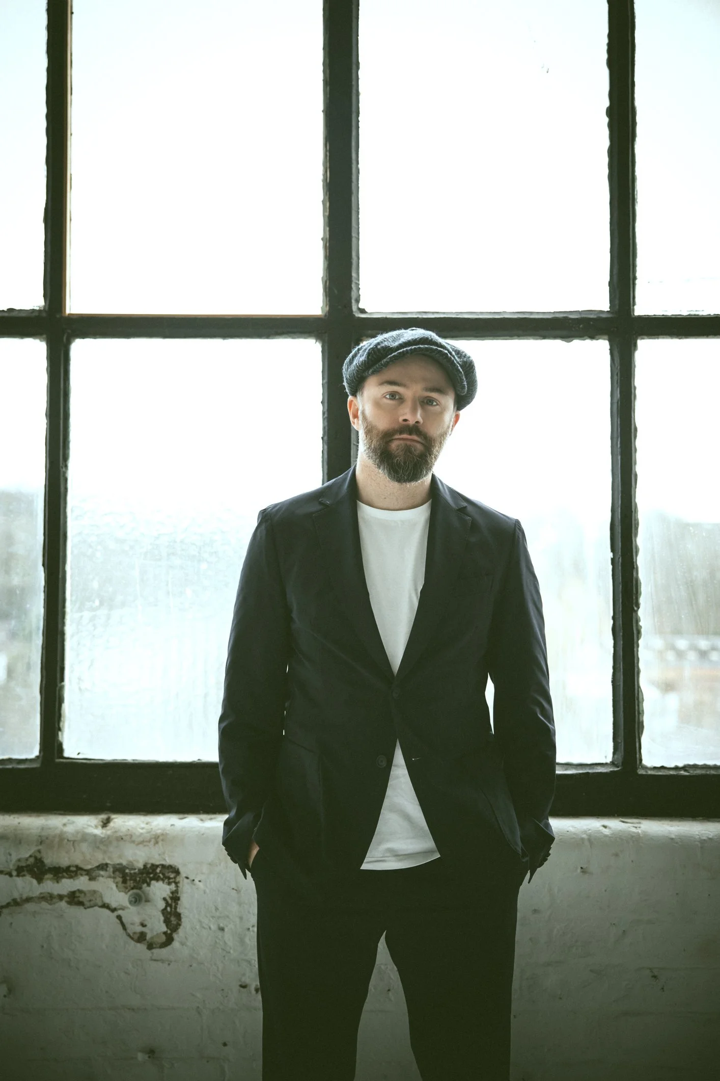 Magazine article about Philip Barantini selling a minority stake in his company, featuring a photo of two individuals, credited to Debbie Ellis.