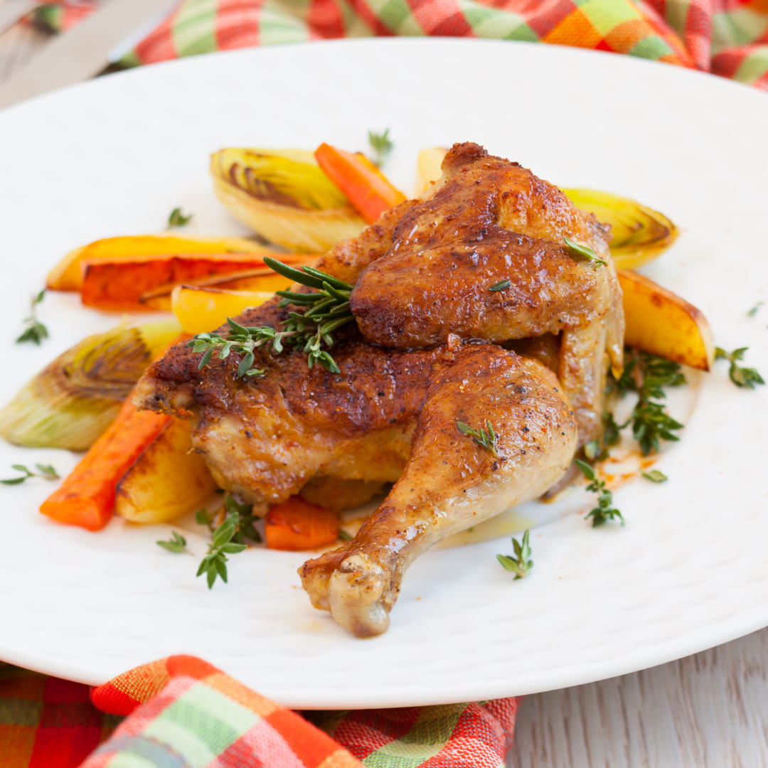 Roasted chicken over carrots and parsnips
